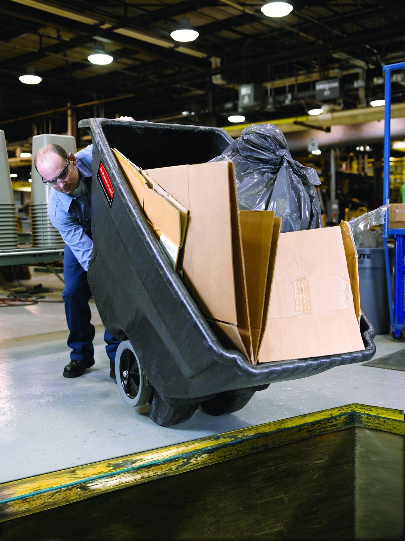Rubbermaid Tilt Dump Truck Commercial Products, 1 Cubic Yard, 2100 lb Capacity, Black, Heavy Load Capacity with Wheels, Trash Recycling Cart for Office/Warehouse/Facility Management
