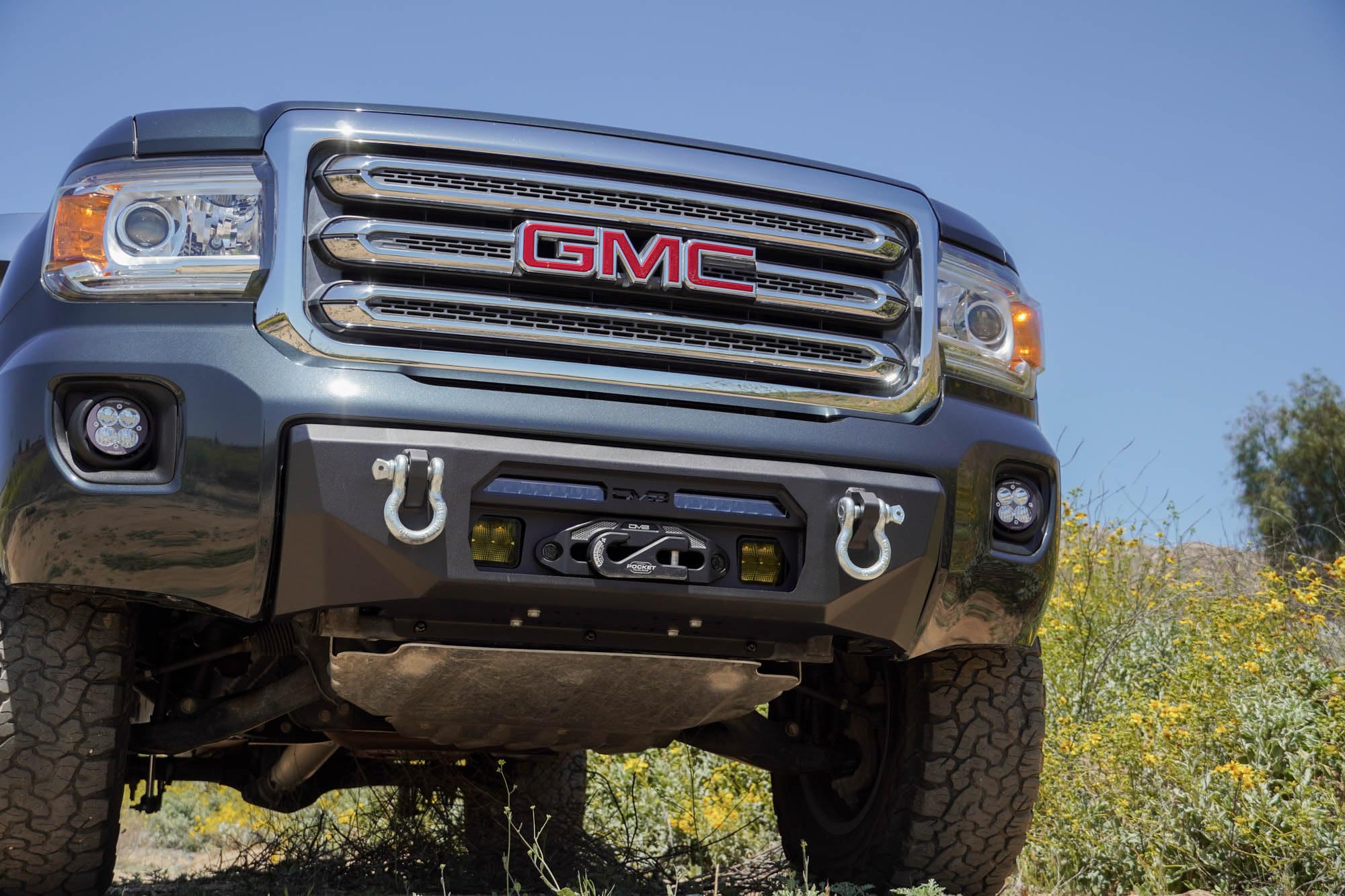Winch Centric Front Bumper for the 2015-2020 GMC Canyon | Two D-Ring Mounts | One 20-Inch LED Light Bar Mount | Two 3-Inch Pod Light Mounts | Zip Tie Tabs | Micro-Texture Black Powder Coat Finish