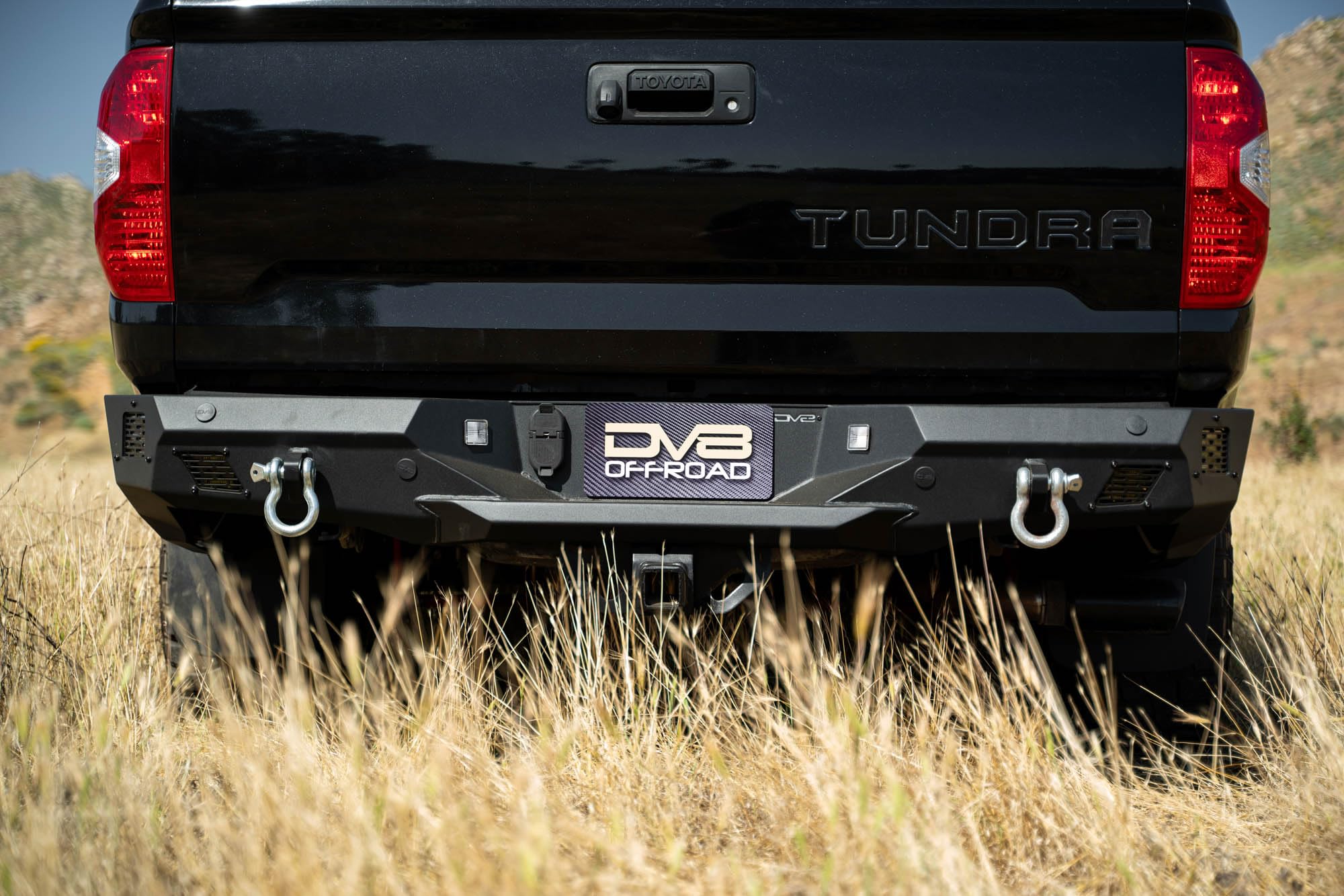 Offroad DV8 Spec Series Rear Bumper for 2014-2021 Toyota Tundra | Two D-Ring Mounts | Four 3-Inch Pod Light Mounts | Satin Black Accent Panels | Welded-In Zip Tie Tabs | Fully Bolt-On