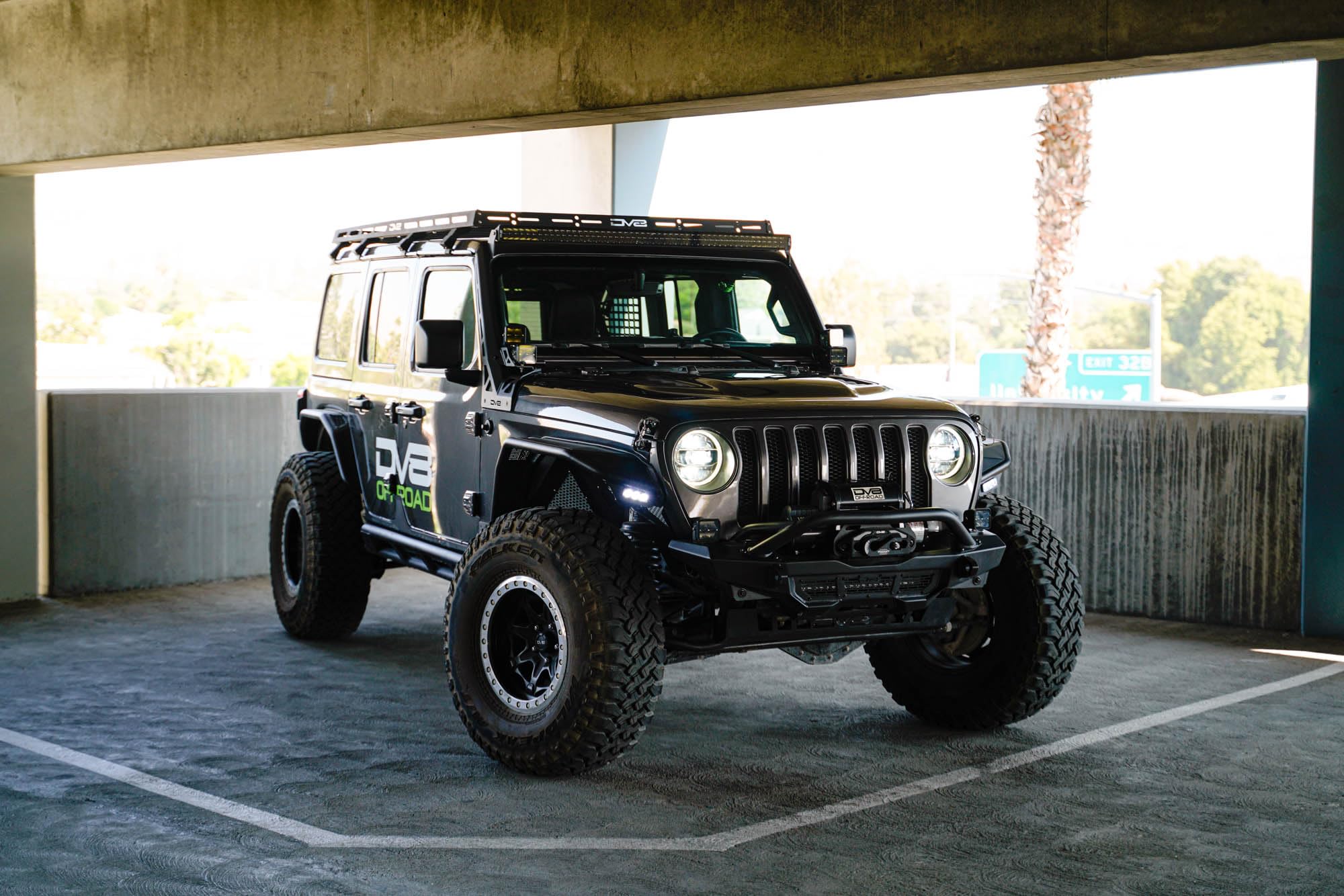 50" Light Bar Mount DV8 Offroad for 2018-2025 Jeep Wrangler JL & 2020-2025 Gladiator JT | Optional 3" Pod Light Mounts | Sleek Low-Profile Design | Black Powder Coat | Bolt-On Installation | Steel