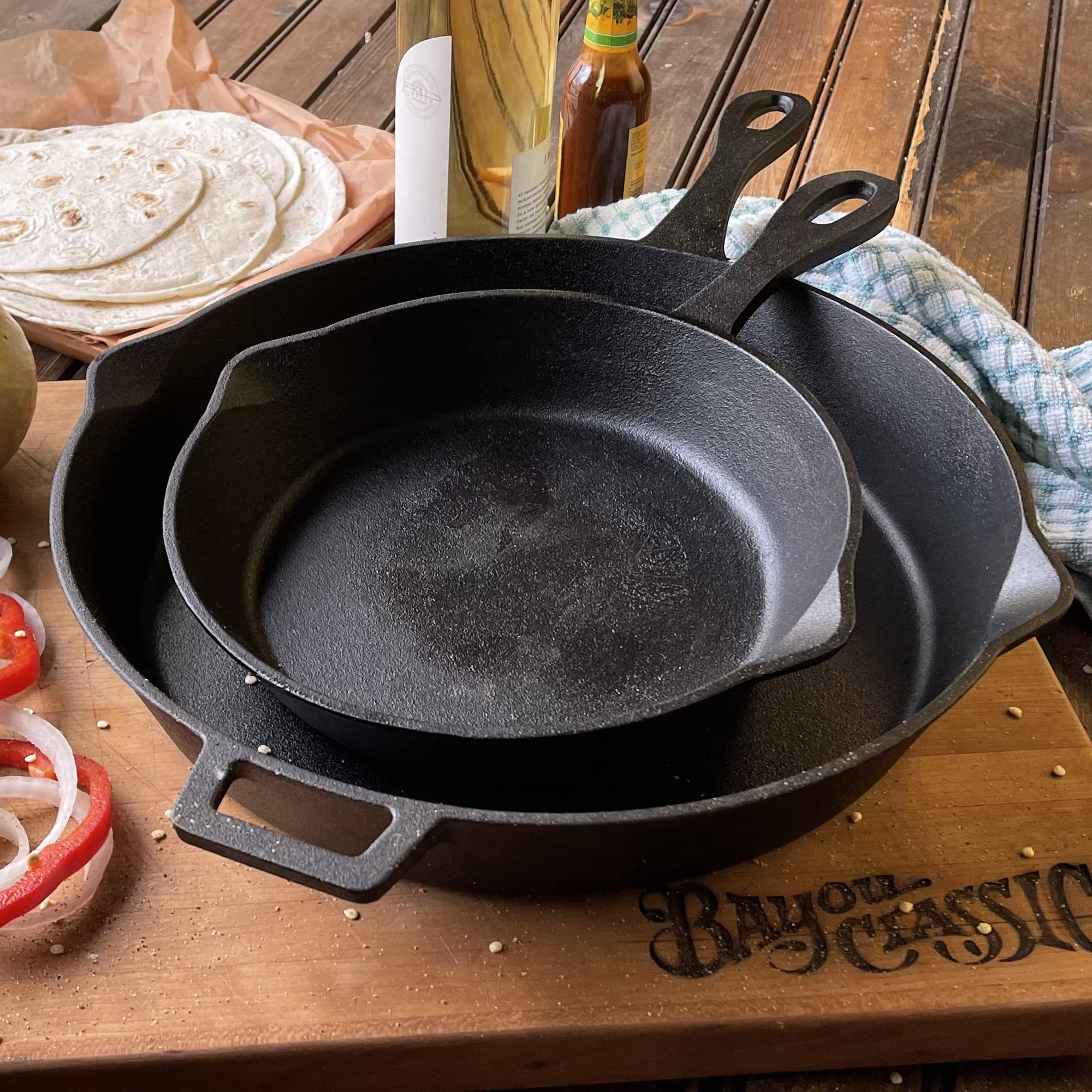 Bayou Classic Skillet Set Includes Pre-Seasoned 10-in and 12-in Handled Cast Iron Skillets with Pour Spouts Perfect For Pan Frying, Sautéing and Baking