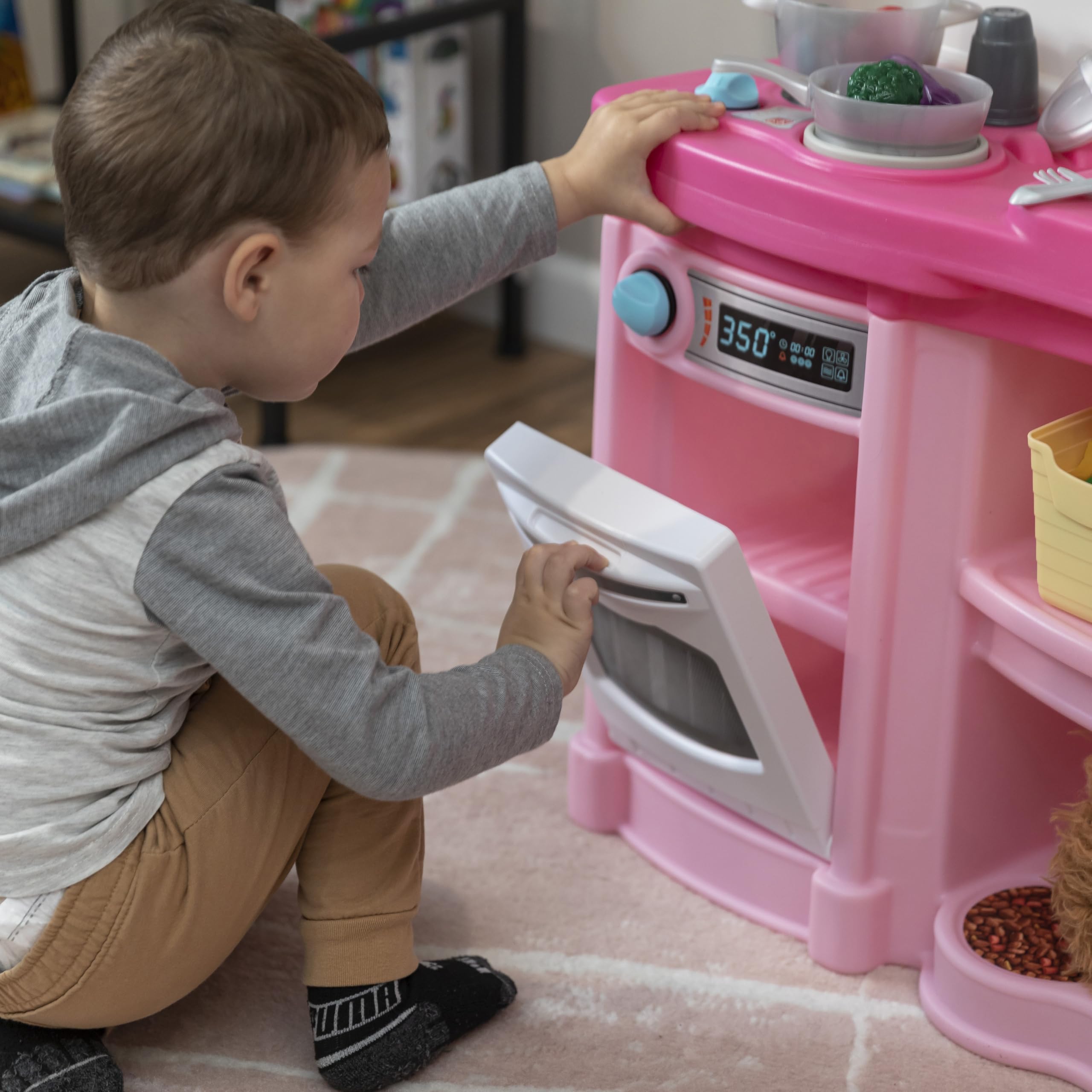 Step2 Fun with Friends Kitchen Playset Kids, Indoor/Outdoor Kitchenette, Interactive Play with Lights and Sounds, Durable Plastic, Includes 25 Piece Toy Accessories, Toddlers 2+ Years Old, Pink