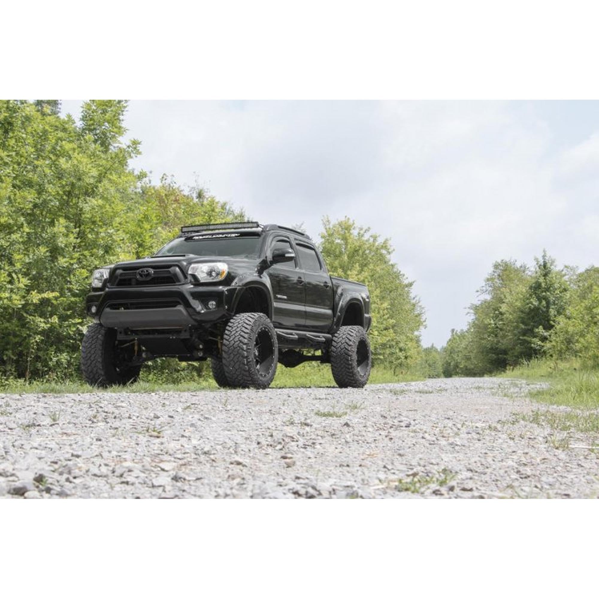 6” Rough Country Lift Kit w/ M1 Struts & M1 Rear Shocks for Toyota Tacoma (2005–2015) - Tuned Suspension Upgrade for On-Road Comfort & Off-Road Control