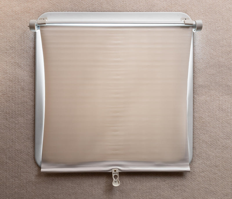 Retractable Camco Lights Out Vent Shade (Cream)