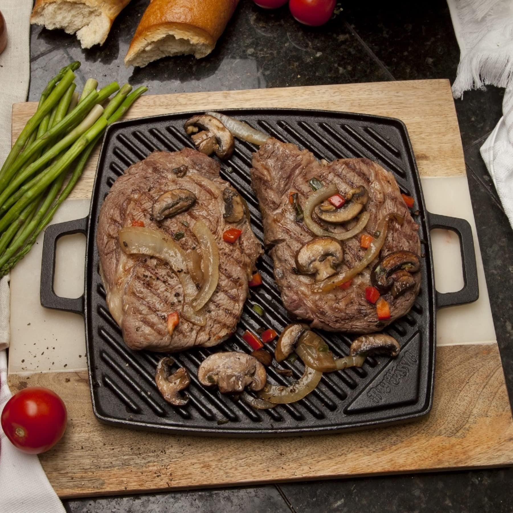 14-in Bayou Classic Cast Iron Reversible Square Griddle Features Flat Side and Ribbed Grill Side Perfect For Large Batch Breakfast Burgers and Grilled Sandwiches Steaks and Chicken