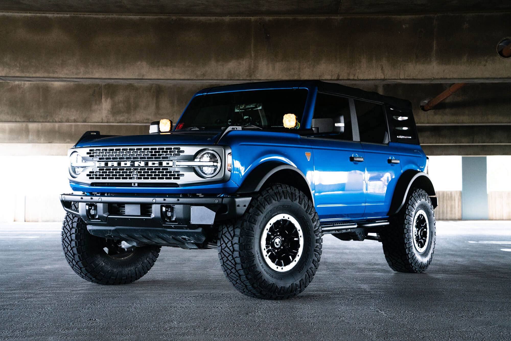 License Plate Relocation Bracket DV8 Offroad for 2021-2024 Ford Bronco | Compatible with The Factory Steel Modular Front Bumper | Side Mounted | Does Not Block Grille