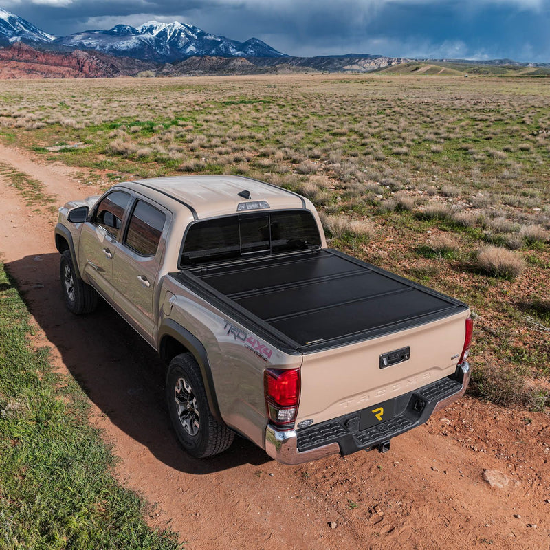UnderCover Ultra Flex Hard Folding Truck Bed Tonneau Cover | UX52016 | Fits 2016 - 2025 Nissan Titan w/ 6' 7" track system Bed (78.7")