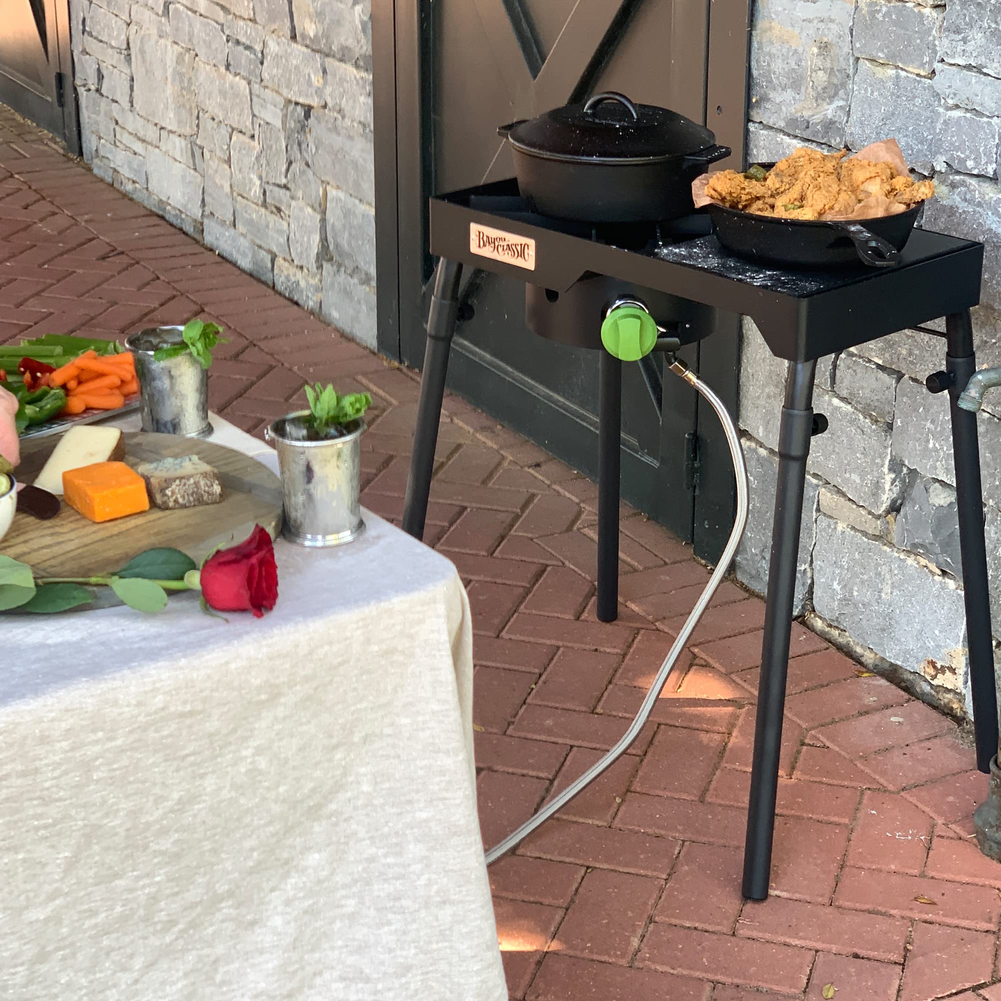 Bayou Classic Camp Stove Dual Patio w/Single Griddle Features Dual 6-in Cast Aluminum Burners 27-in Tall Cooker 13.5-in x 13.5-in Square Removable Griddle Perfect For Backyard Chefs Tailgates