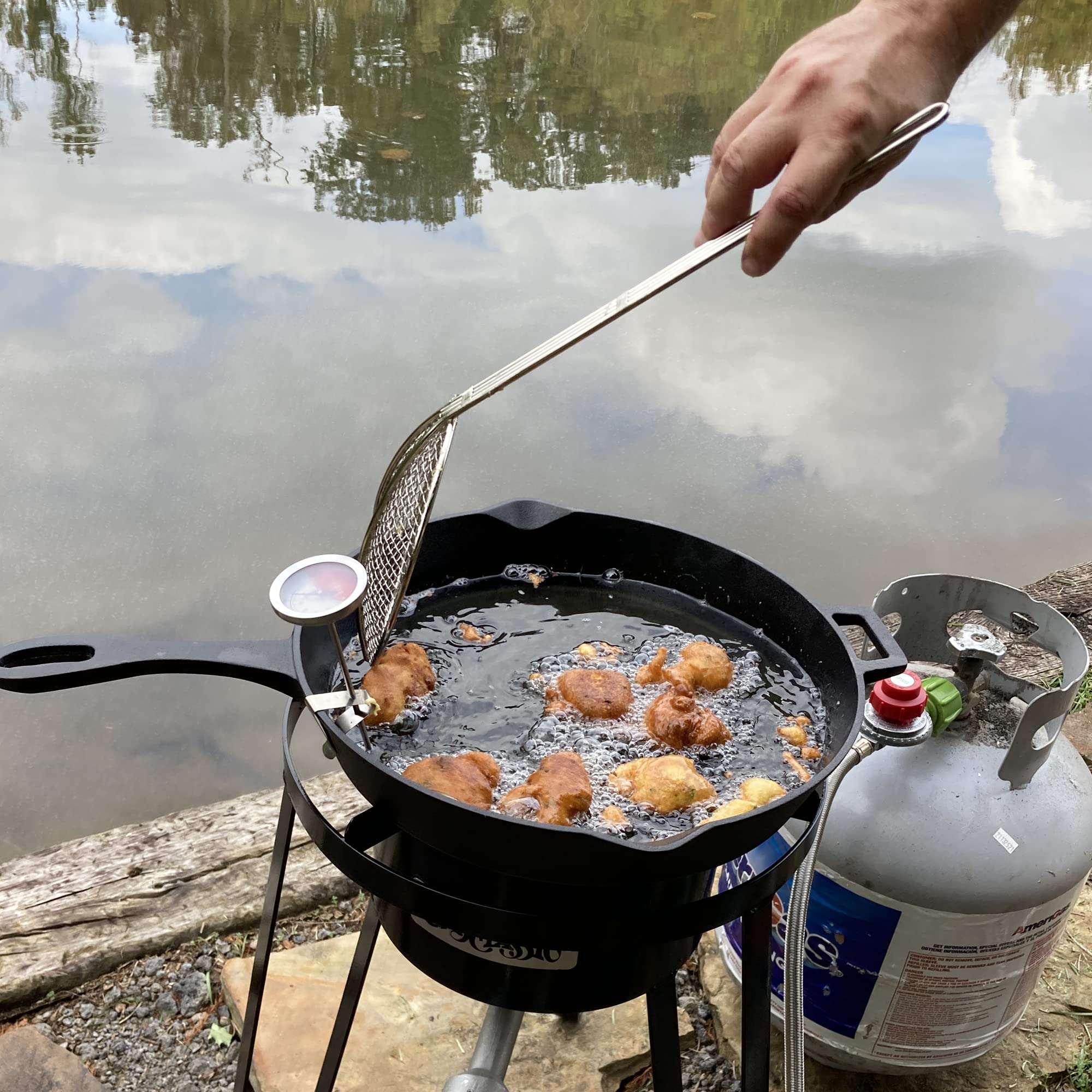 Bayou Classic 14-in Cast Iron Skillet Features Helper Handle and Pour Spouts Perfect For Searing Braising Frying and Baking Pies and Cobblers