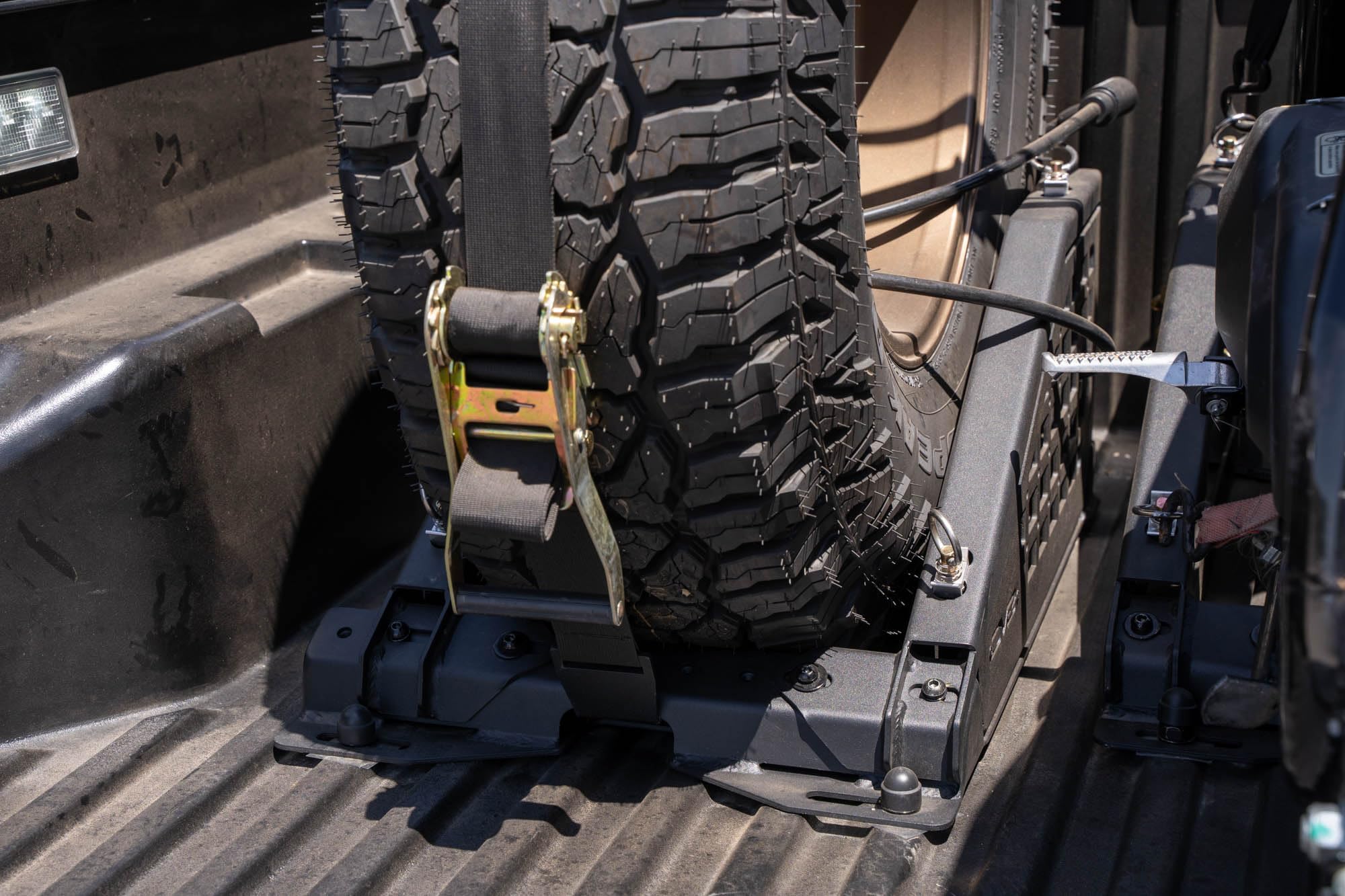 Offroad DV8 Truck Bed Universal Tire Carrier & Accessory Mount | Featured Side Molle Panels for Mounting Gear & Supplies | Adjustable for Carrying Various Sized Tires and Bikes | Powder Coated Finish