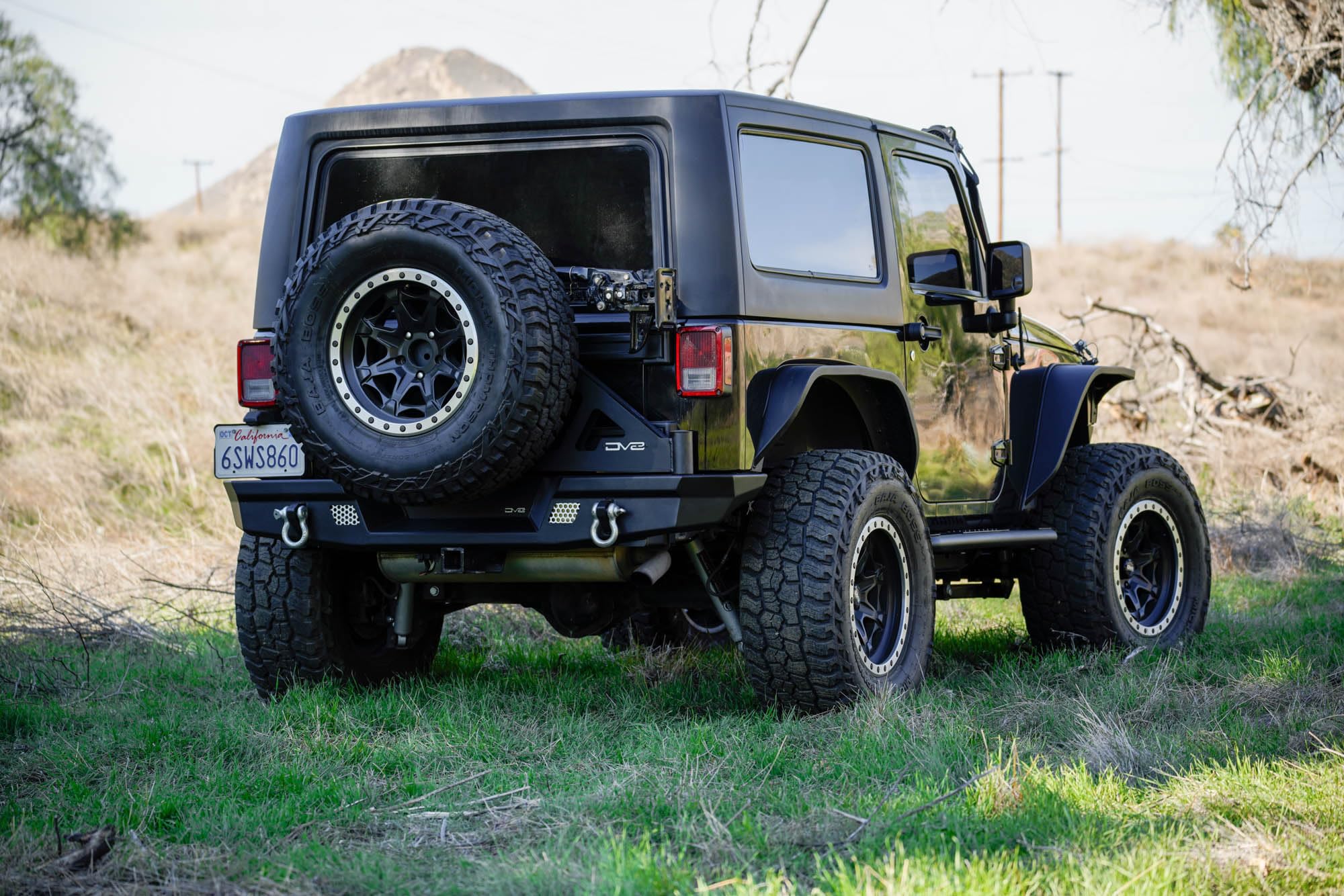 DV8 Offroad Spare Tire Carrier for 2007-2018 Jeep Wrangler JK | MTO Rear Bumper Mounts Only to DV8 Offroad’s MTO Rear Bumper (RBJK-13) | Will Fit Most 38x13.50 Tires