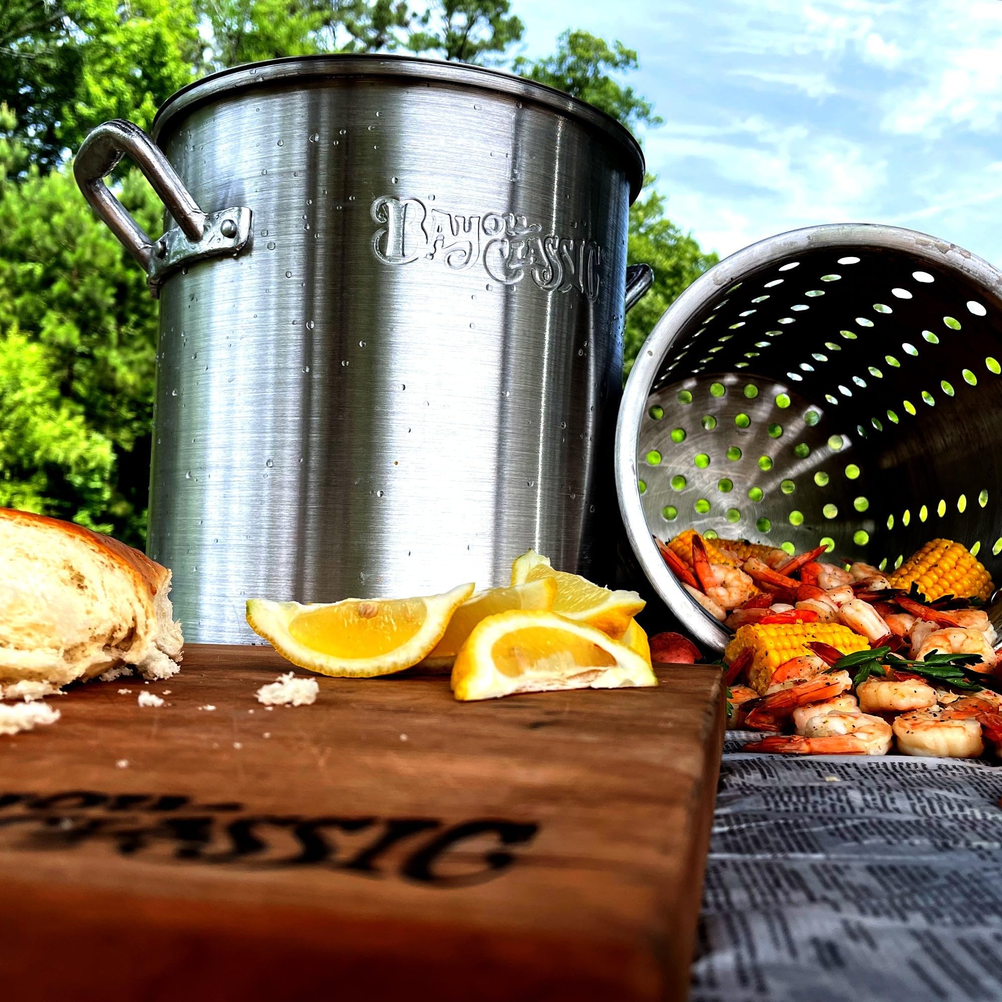 25-qt Bayou Classic Aluminum Shrimp Pot Features Perforated Basket Domed Vented Lid Heavy Riveted Handles Perfect For a Classic Shrimp Boil