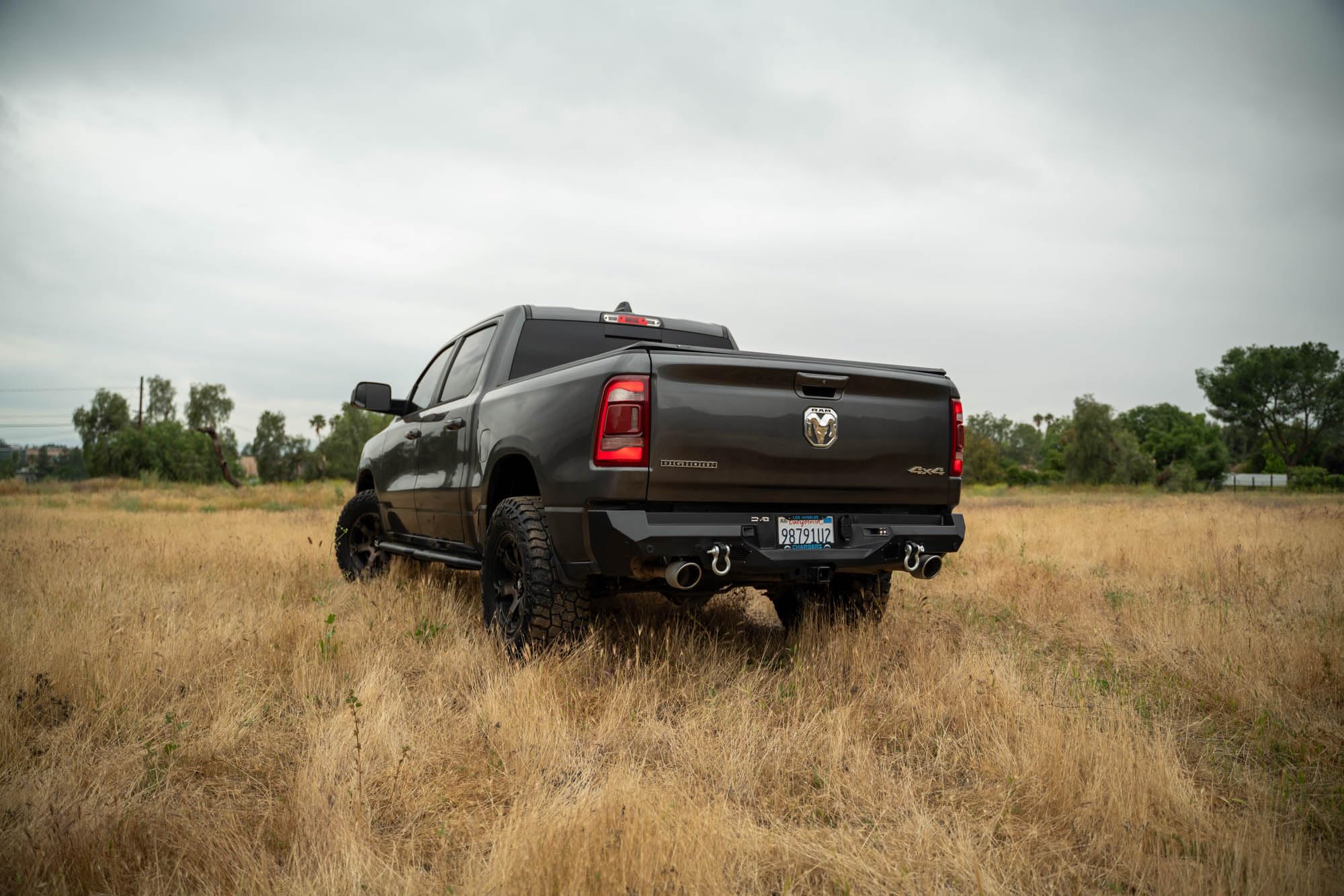 DV8 Offroad Rear Bumper Spec Series Compatible with 2019-2024 Ram 1500 Single and Dual Exhaust Models | Mount two 3" Pod Lights | Recovery Points | Fully Bolt-On | Powder Coated Finish