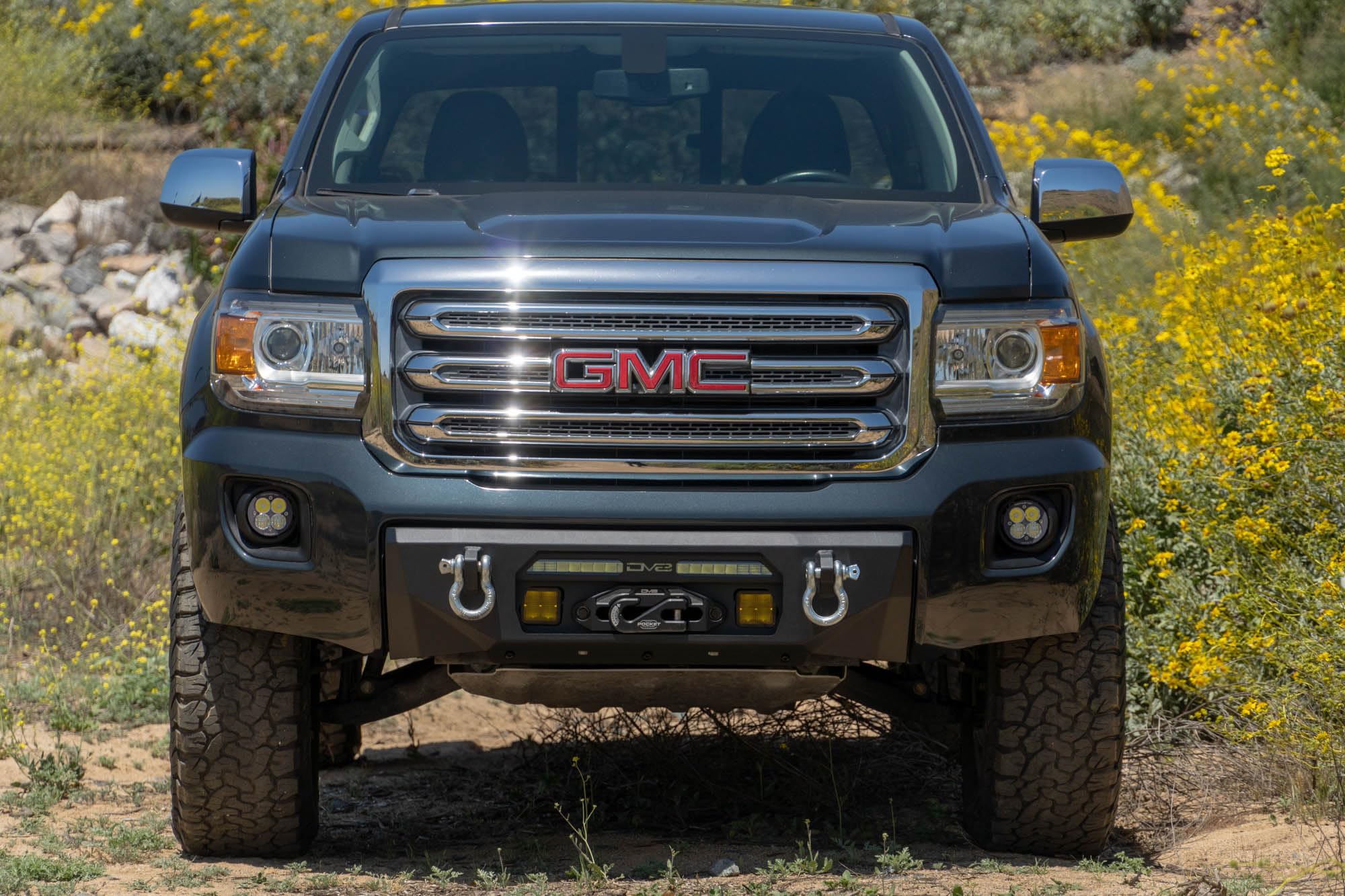 Winch Centric Front Bumper for the 2015-2020 GMC Canyon | Two D-Ring Mounts | One 20-Inch LED Light Bar Mount | Two 3-Inch Pod Light Mounts | Zip Tie Tabs | Micro-Texture Black Powder Coat Finish