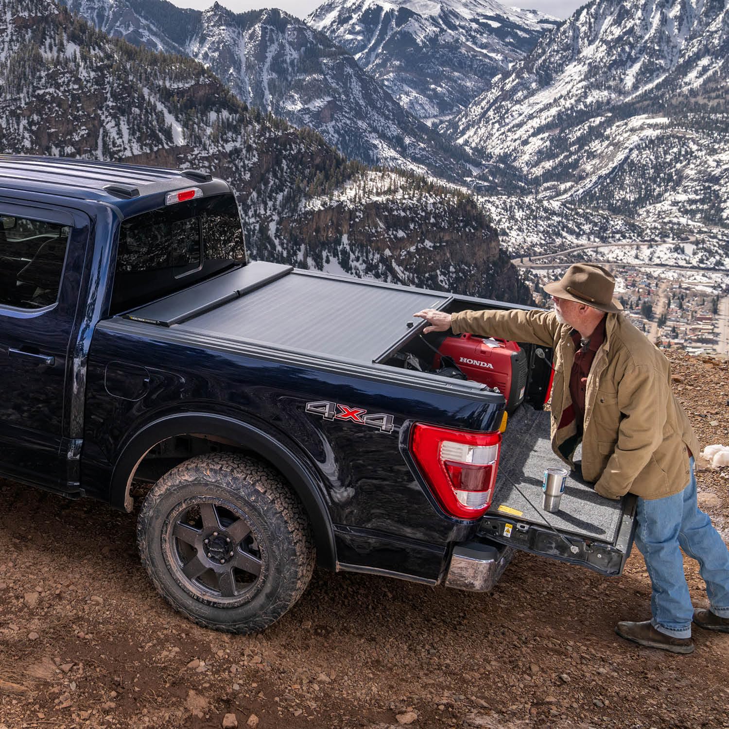Roll-N-Lock A-Series RealTruck Retractable Truck Bed Tonneau Cover | BT111A | Fits 2009 - 2014 Ford F-150 5' 7" Bed (67")