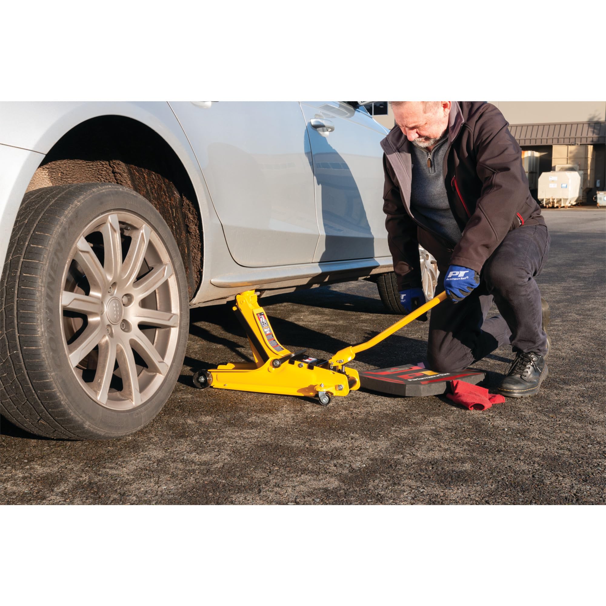 2-1/2 Ton Performance Tool Low-Profile Trolley Jack, Flanged, Powder-Coated Steel, Swivel Wheels, Carry Handle, Portable, Yellow/Black