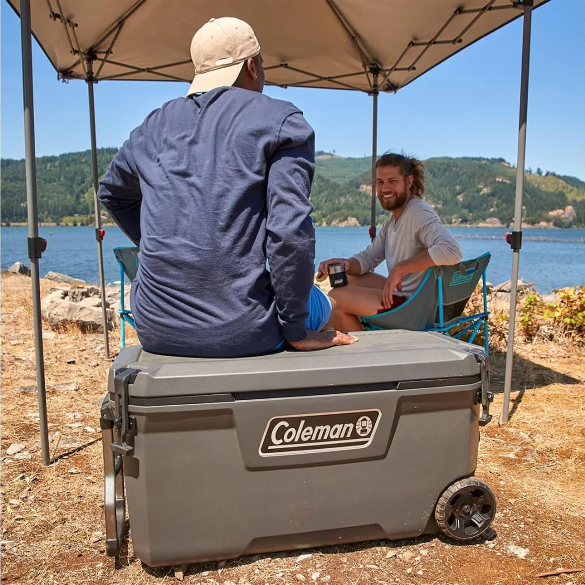 Coleman 100 Quart Convoy Series Portable Cooler with Wheels, Metal Handle, and Nonslip Grip Reflective Metal Handle for Outdoor Adventures, Dark Storm