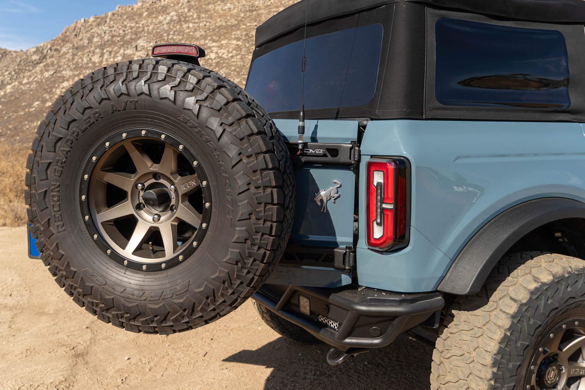 Offroad DV8 Tire Carrier for 2021-2025 Ford Bronco | Heavy-Duty Design | Absorbs Weight of Spare Tire & Tailgate Door | Included Third Brake Light Extension | Fully Bolt-On Installation | Steel