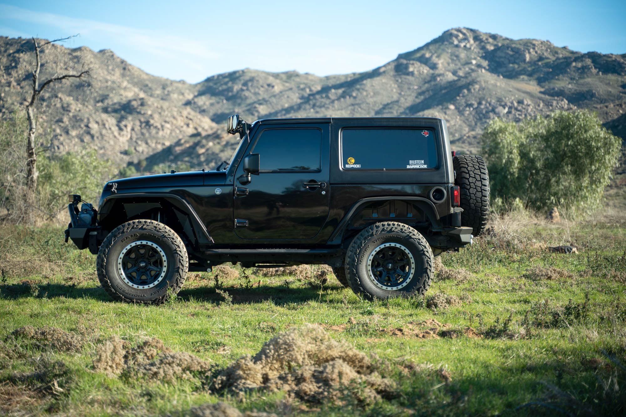 MTO Series DV8 Offroad Rear Bumper for the 2007-2018 Jeep Wrangler JK | Jeep Full-Width Rear Bumper | Mounts for (2) 3” Light Pods | Fits up to 37” Spare Tire (Max 4.5” Backspacing Wheels)