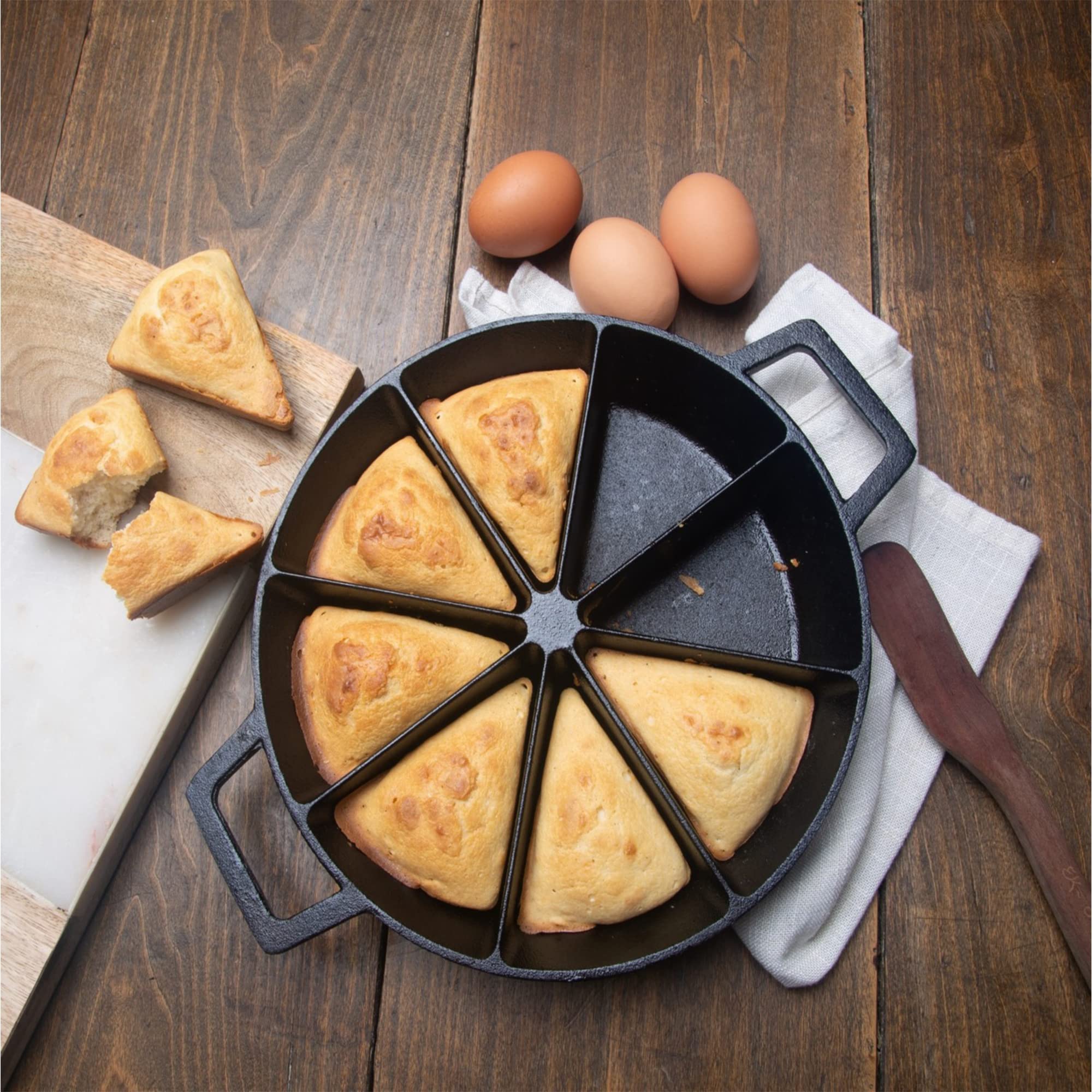 Bayou Classic 10-in Wedge Cornbread Cast Iron Skillet Features Side Loop Handles For Easy Transport Bakes 8 Wedges of Cornbread