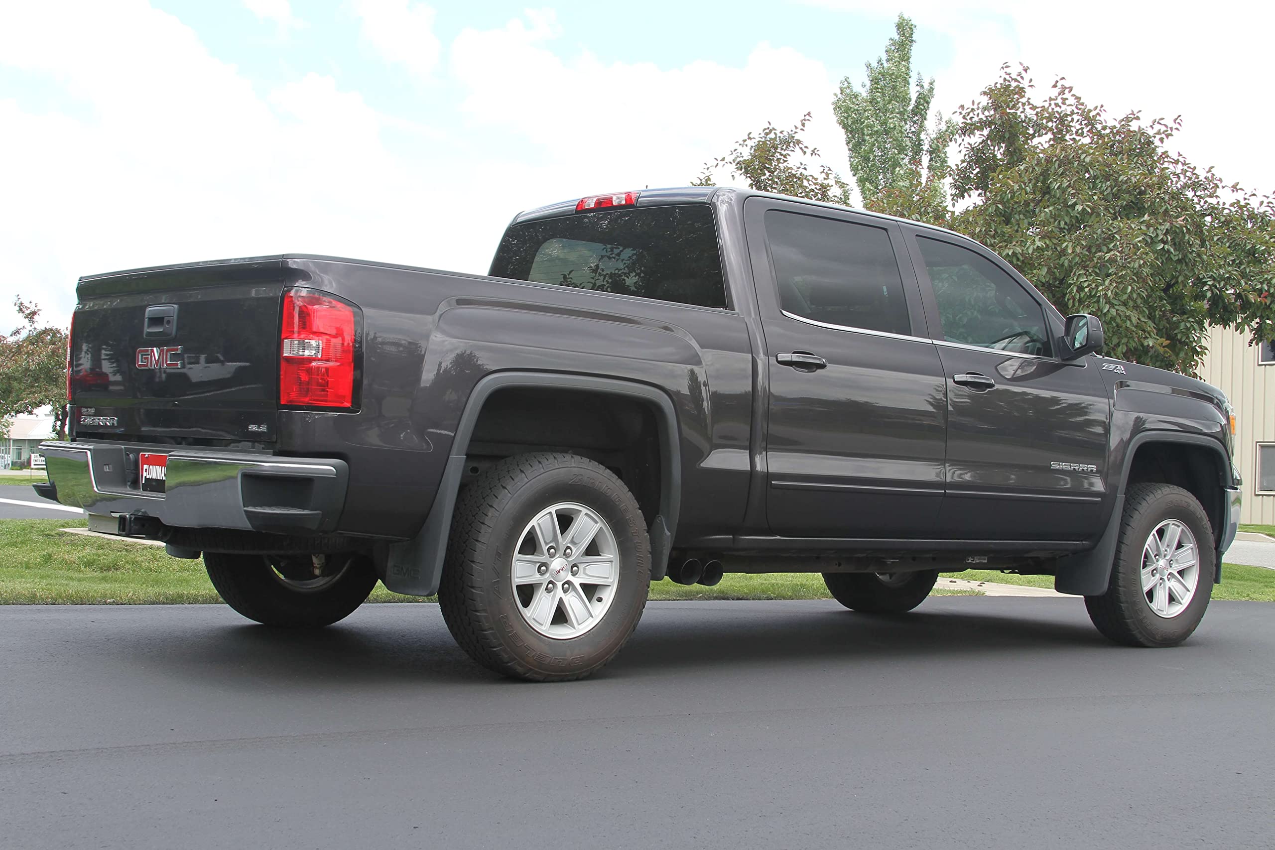 Flowmaster FlowFX 717787 Cat-Back Exhaust Kit Dual 2.5 Inch Stainless Steel 4 Inch Black Ceramic Tips Compatible with 2014-2019 Classic Body Chevy Silverado GMC Sierra 1500 Crew Double Cab 4.3L 5.3L