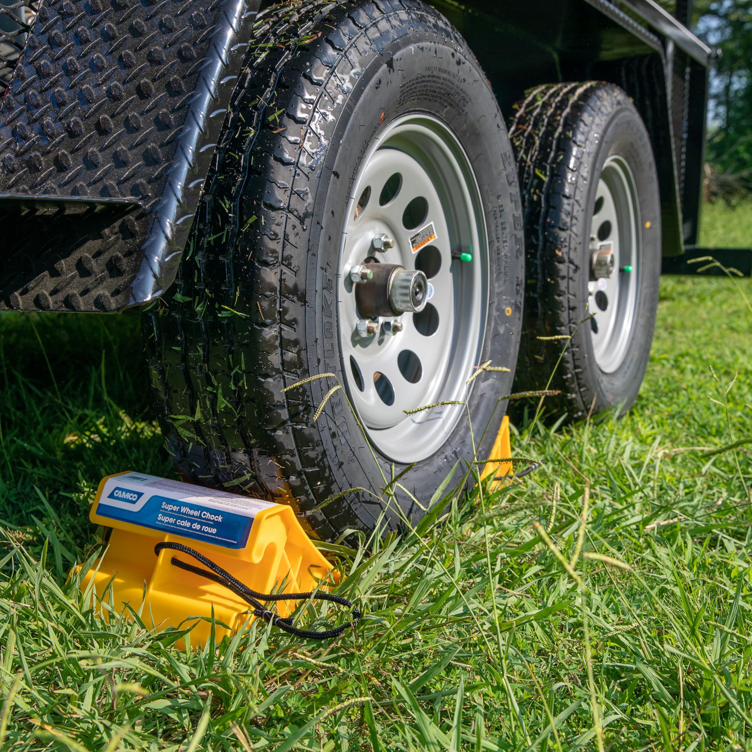 Camco Super Wheel Chock - Large, Heavy Duty Trailer Chock w/Rope Constructed of Durable Plastic - Features Rope Handle for Easy Removal - Use w/Tires Up to 29-inches – 44475