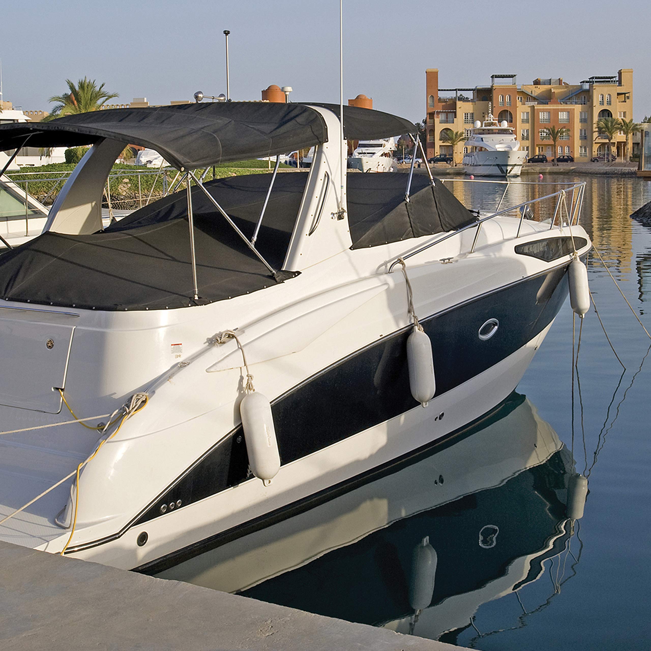 Taylor Made Inflatable Boat Fender Hull-Gard, Ruby Red (5.5" x 20"), Unique Oval Shape, Molded Football Needle Inflation Valve, Seamless Construction, Double Eyelets - 551022