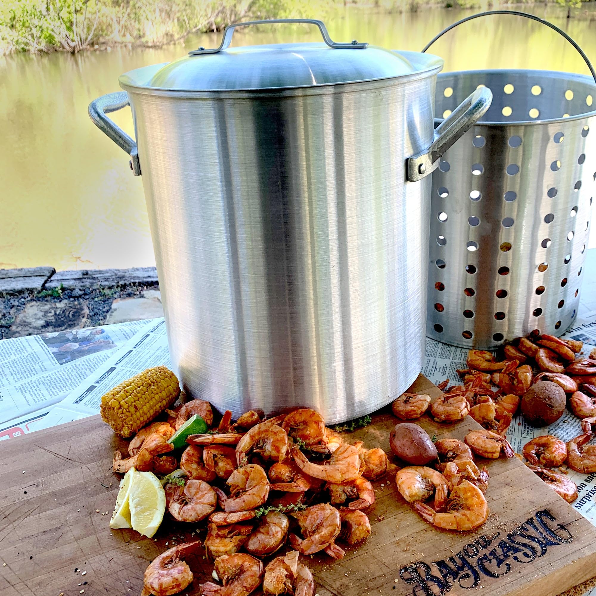 25-qt Bayou Classic Aluminum Shrimp Pot Features Perforated Basket Domed Vented Lid Heavy Riveted Handles Perfect For a Classic Shrimp Boil