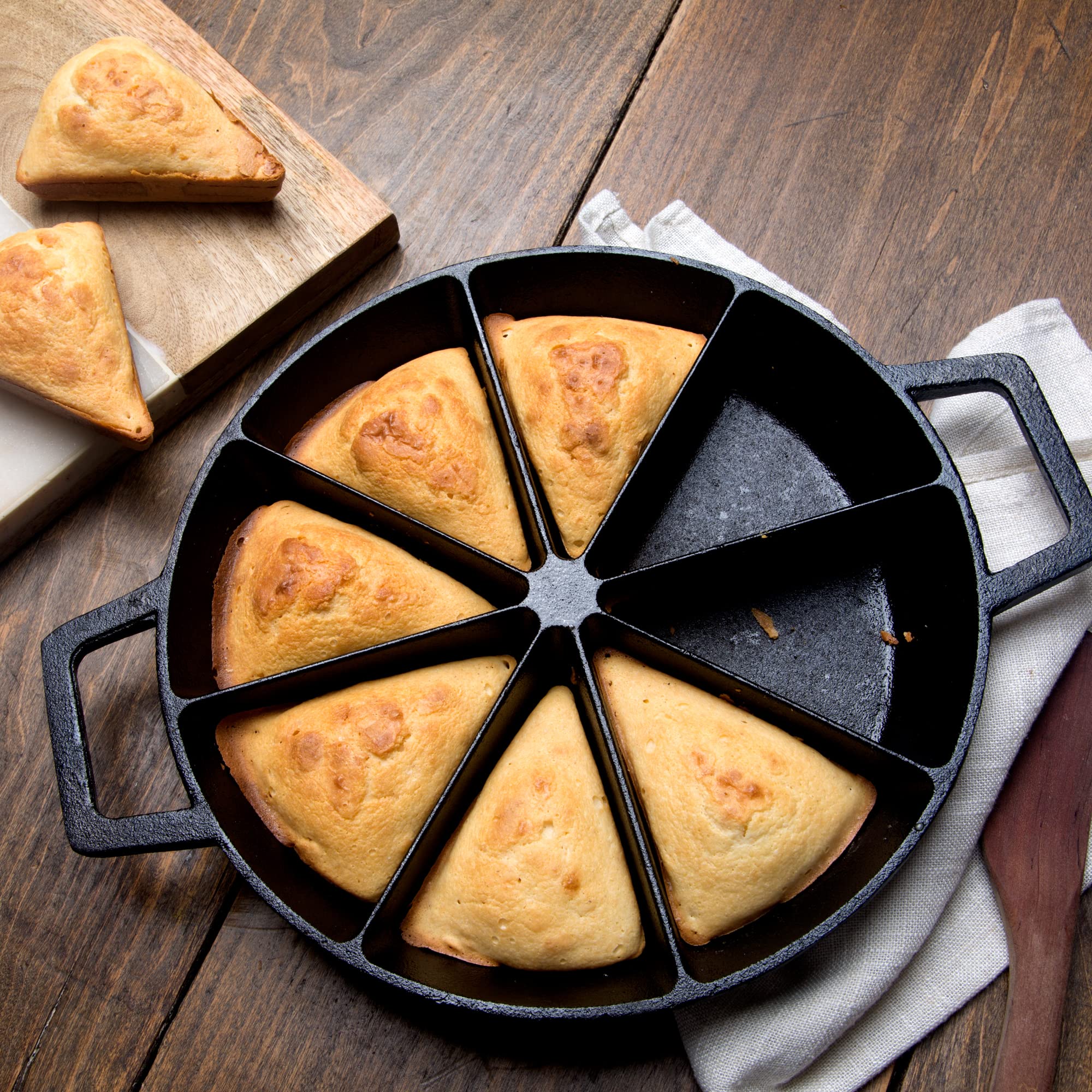 Bayou Classic 10-in Wedge Cornbread Cast Iron Skillet Features Side Loop Handles For Easy Transport Bakes 8 Wedges of Cornbread