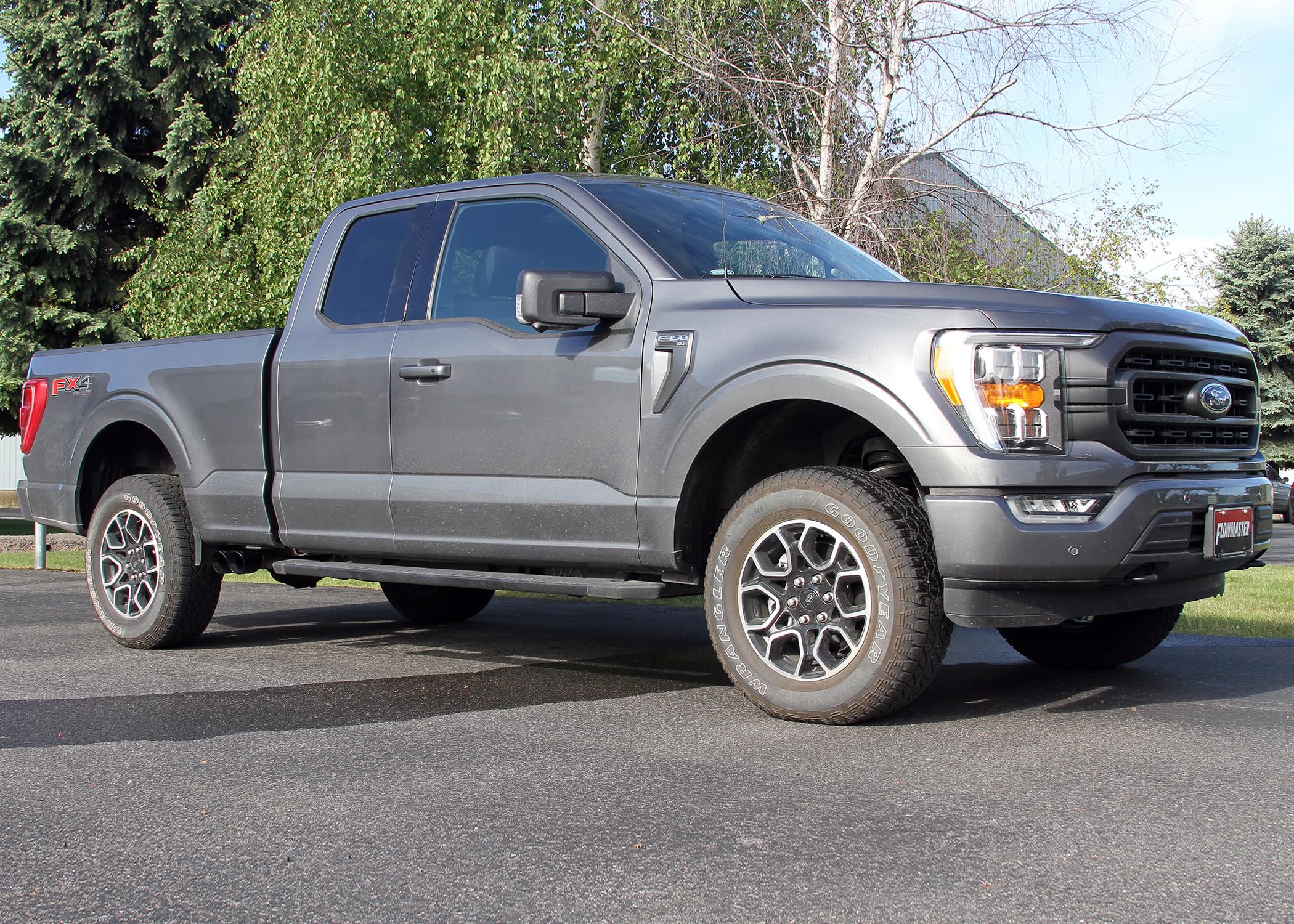 Flowmaster FlowFX 718116 Cat-Back Exhaust Kit 3 to 2.5 Inch Dual Same Side Exit 409 Stainless Steel 4 Inch Black Ceramic Coat 304 Stainless Steel Tips Compatible with 2020-2024 Ford F-150 2.7 3.5 5.0L