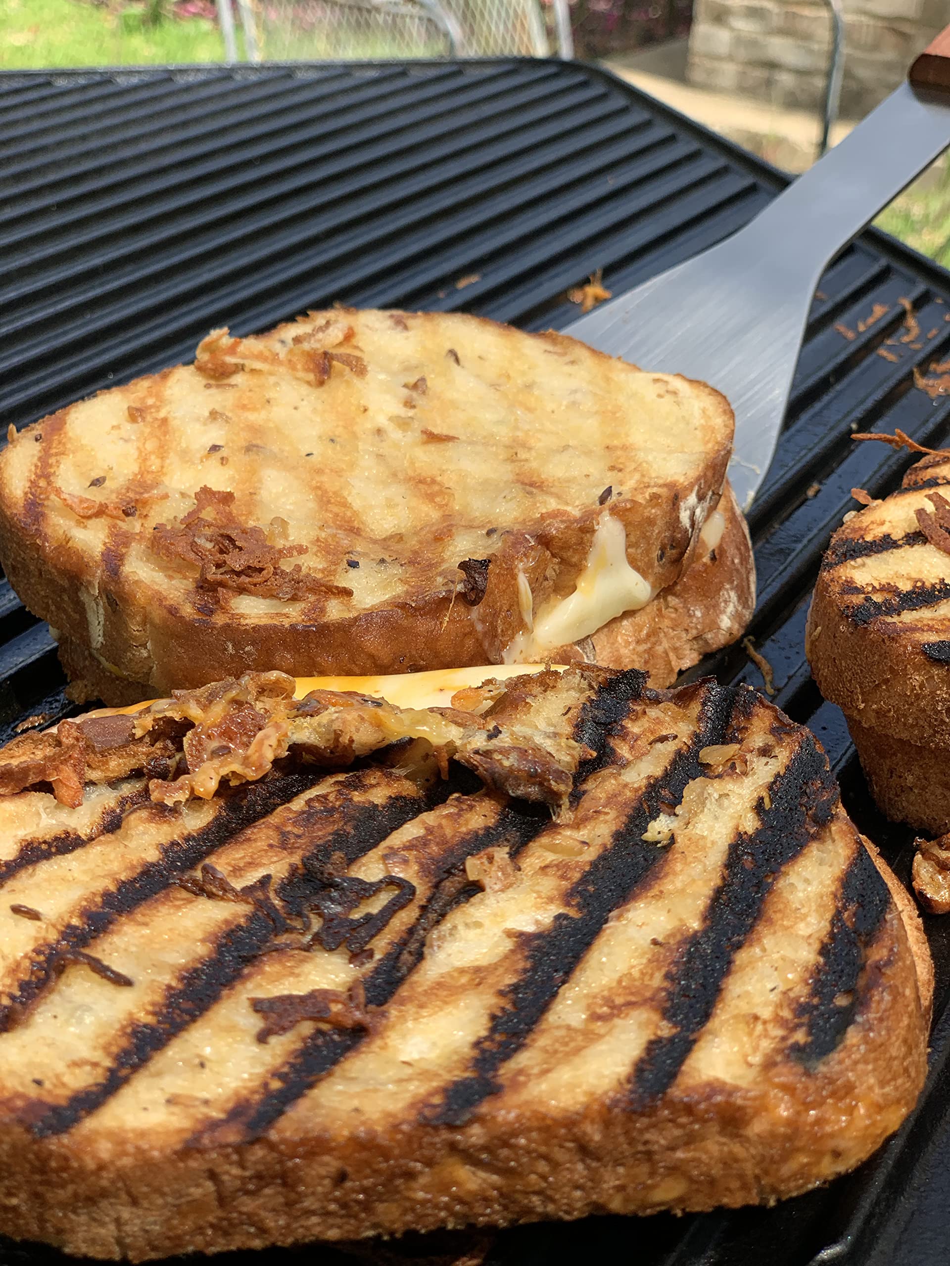 Bayou Classic 18-in Double Reversible Cast Iron Griddle Features Flat Side and Ribbed Grill Side Perfect For Large Batch Breakfast Burgers and Grilled Sandwiches Steaks and Chicken