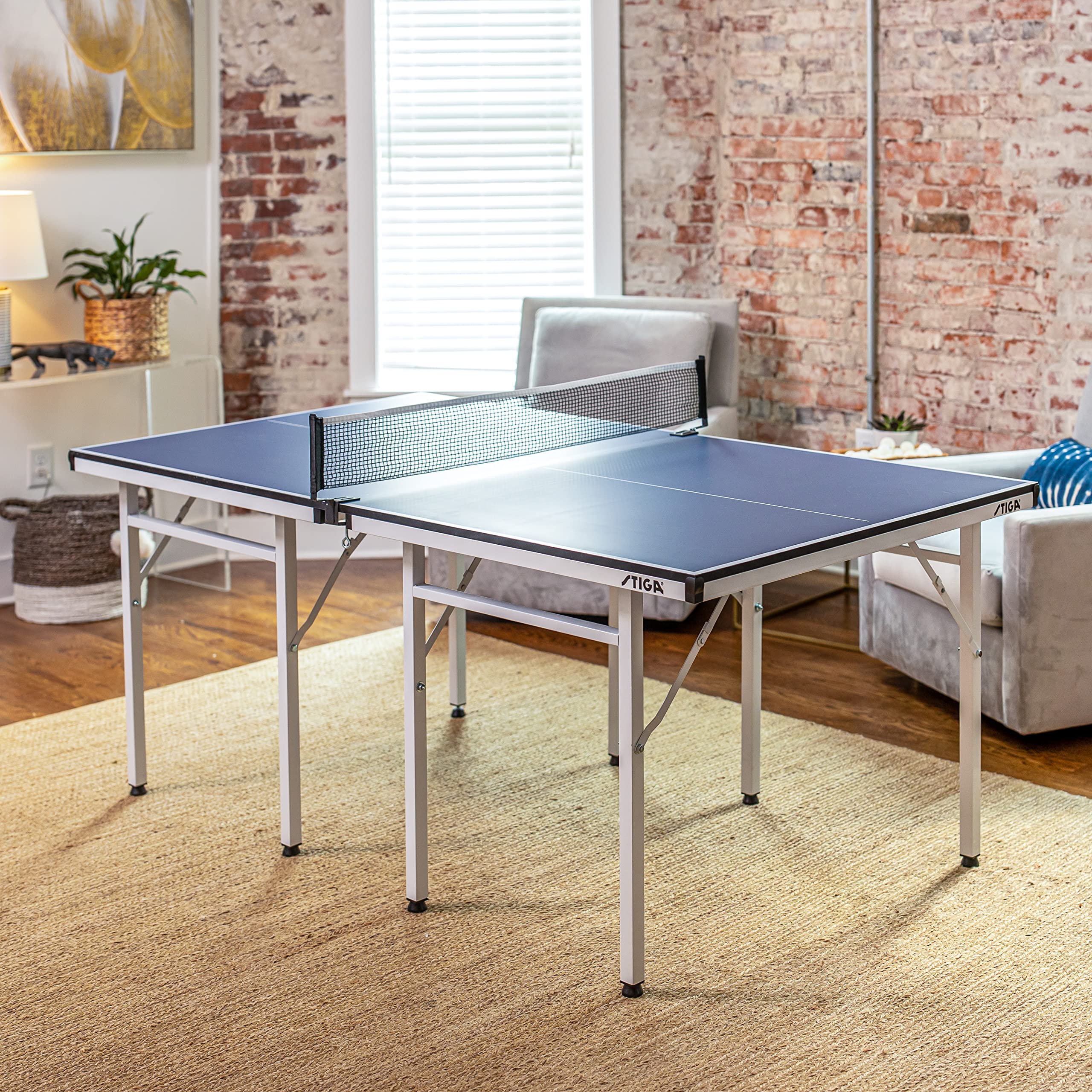 Mid-Size Portable STIGA Space Saver Table Tennis Table - Compact Storage Fits in Most Closets – Includes Ping-Pong Net & Post - No Assembly Required