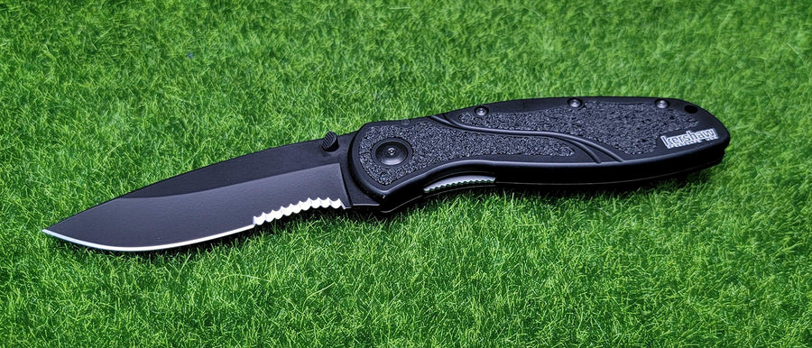 BLACK SERRATED KNIFE, BLUR
