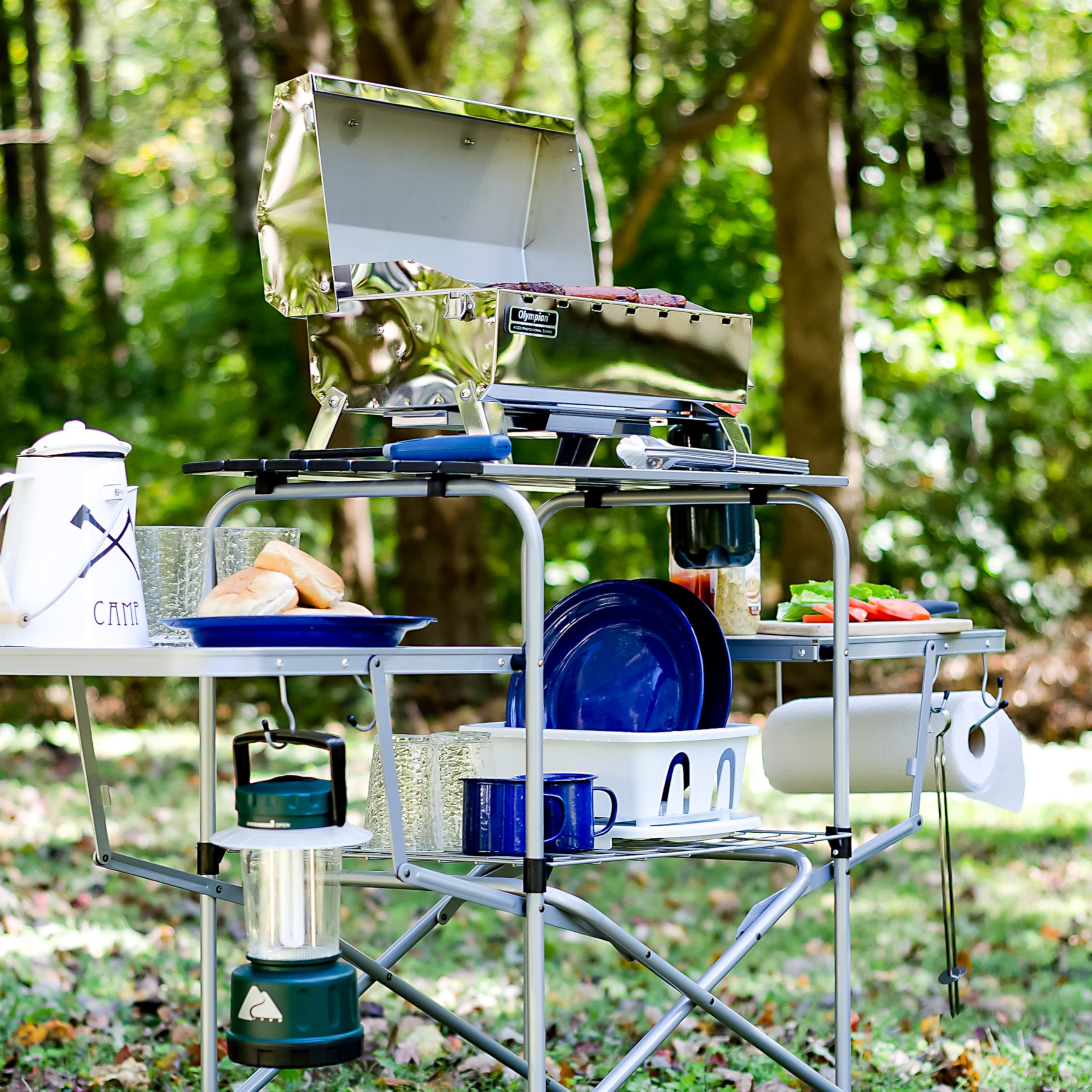 Camco Deluxe Olympian Portable Grill Table - Provides Plenty of Room for Grilling Gear While Camping - Folding Grilling Table Collapses for Compact Storage - Supports Up to 100lb (57293)