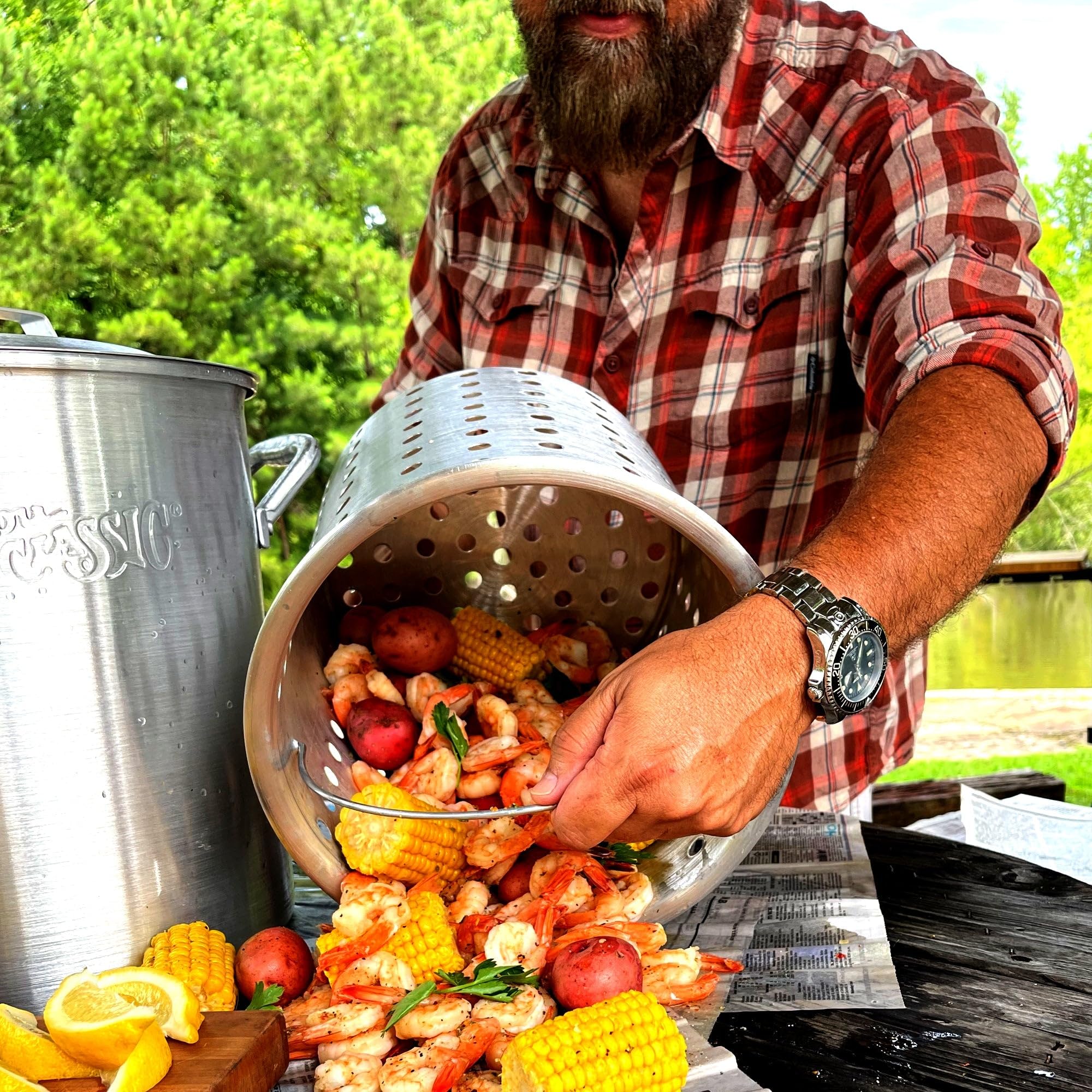 25-qt Bayou Classic Aluminum Shrimp Pot Features Perforated Basket Domed Vented Lid Heavy Riveted Handles Perfect For a Classic Shrimp Boil