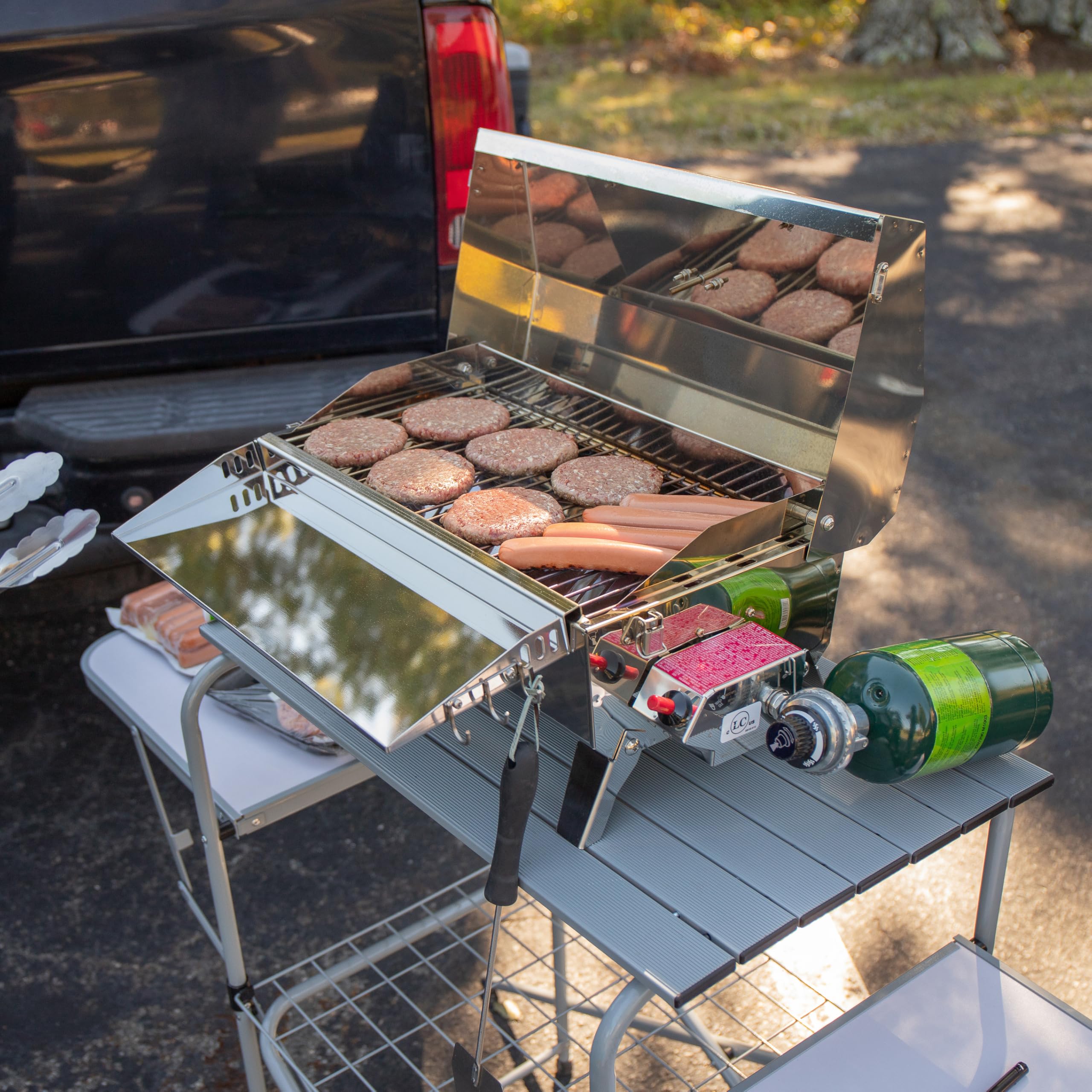 Camco Deluxe Olympian Portable Grill Table - Provides Plenty of Room for Grilling Gear While Camping - Folding Grilling Table Collapses for Compact Storage - Supports Up to 100lb (57293)