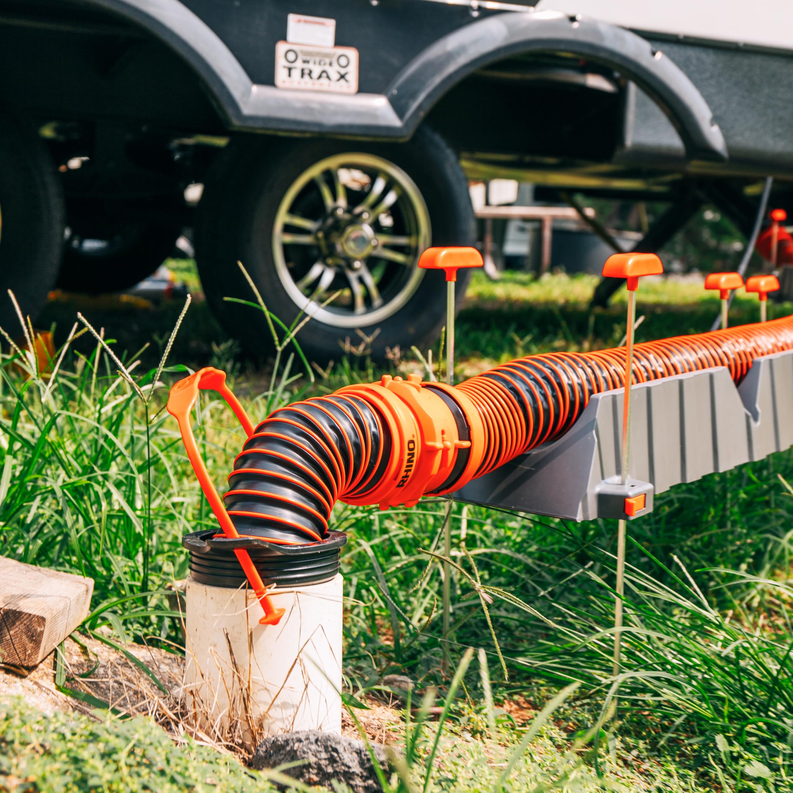 Camco 3-in-1 Flexible RV Sewer Hose Adapter & Drain Seal - Easily Connect Your Camper Sewer Hose to 3, 3 1/2, or 4 inch Inlets Even with Damaged Threads - Features RhinoExtreme Hose and Handle (39319)