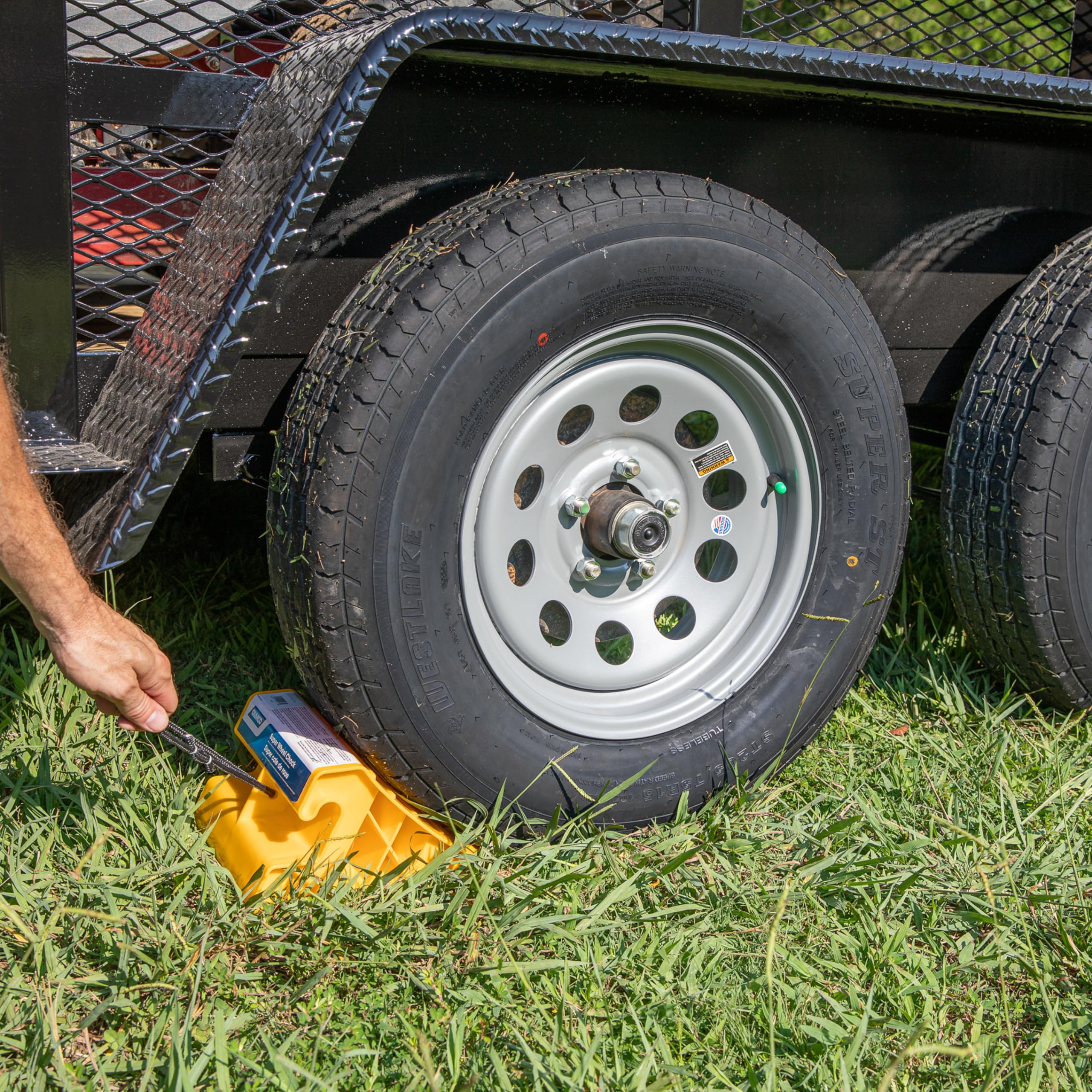 Camco Super Wheel Chock - Large, Heavy Duty Trailer Chock w/Rope Constructed of Durable Plastic - Features Rope Handle for Easy Removal - Use w/Tires Up to 29-inches – 44475