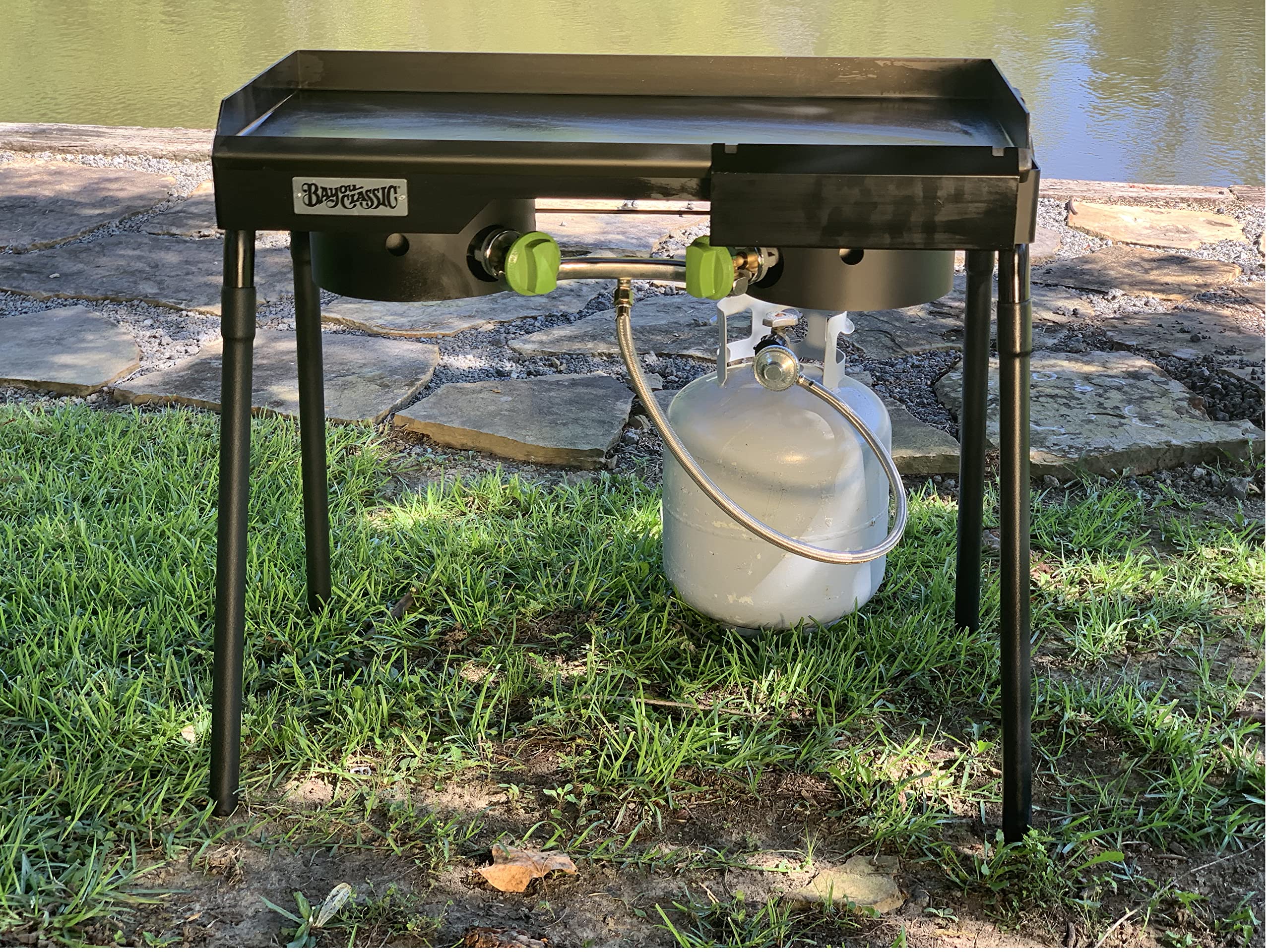 Bayou Classic Camp Dual Patio Stove w/Double Griddle Features Dual 6-in Cast Aluminum Burners 27-in Tall Cooker 13.5-in x 13.5-in Square Removable Griddle Perfect For Backyard Chefs Tailgates