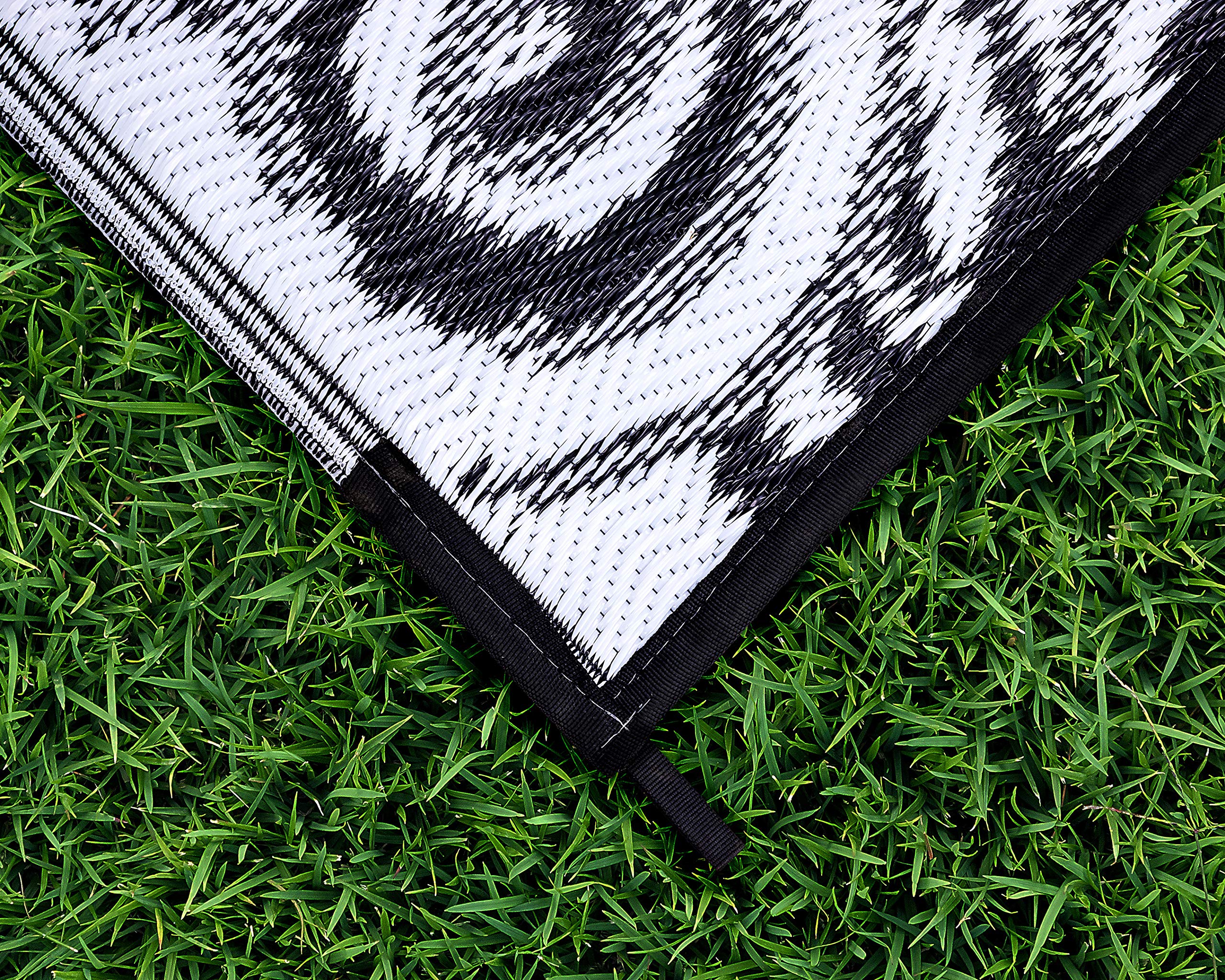 Reversible Camco RV Awning and Outdoor Mat | Ideal Accessory for RVing, Camping, Picnicking, Sporting Events, and More | 8-feet by 16-feet | Charcoal and White (42843)