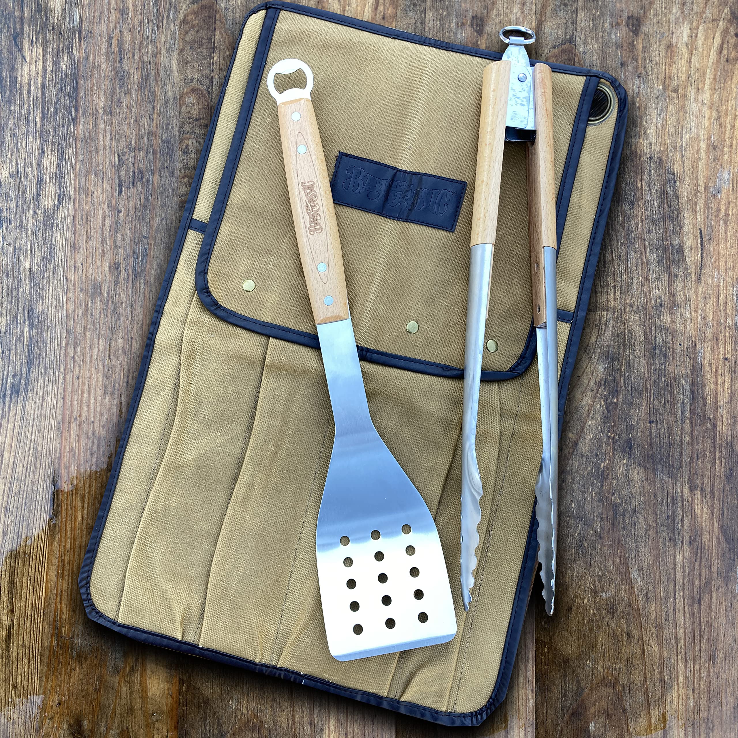 Grill Bag and Tool Set Bayou Classic Features 17-in Grill Spatula w/Bottle Opener and 16-in Locking Grill Tongs Waxed Canvas Bag w/ 4 Tool Pockets and Leather Detail